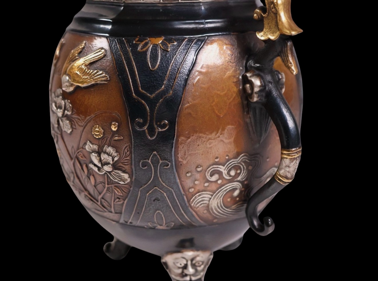 Takaoka bronze koro: close-up of Kirin, dragon handle, precious metal inlay on katana antique.