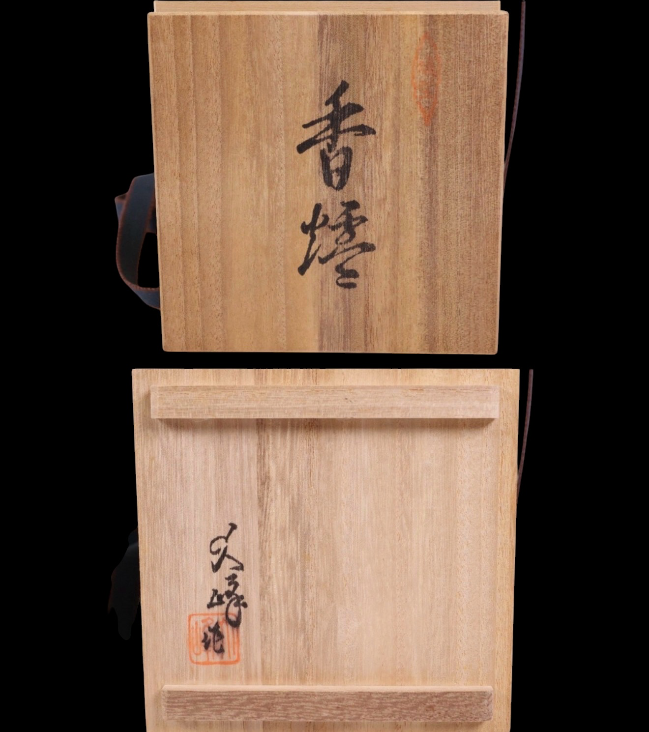 Top view of wooden box for Takaoka bronze koro, showing Japanese calligraphy inscription, for katana category.