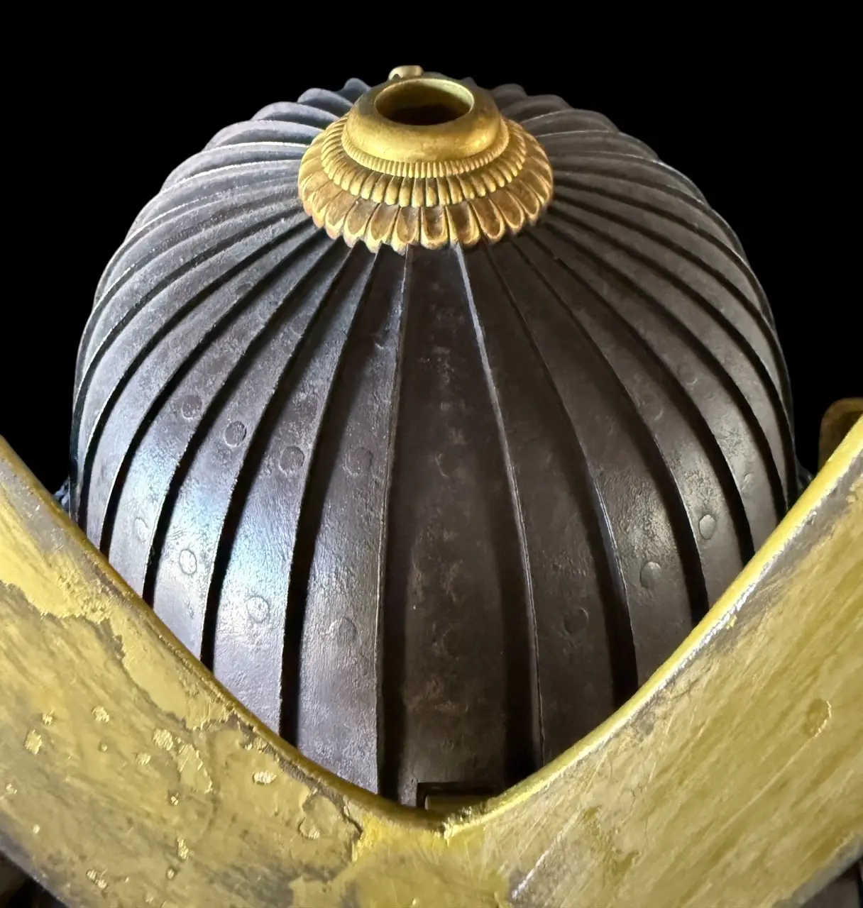 Close-up: samurai armor kabuto, Mogami Dou Gusoku Armor, with golden finial and crest detail