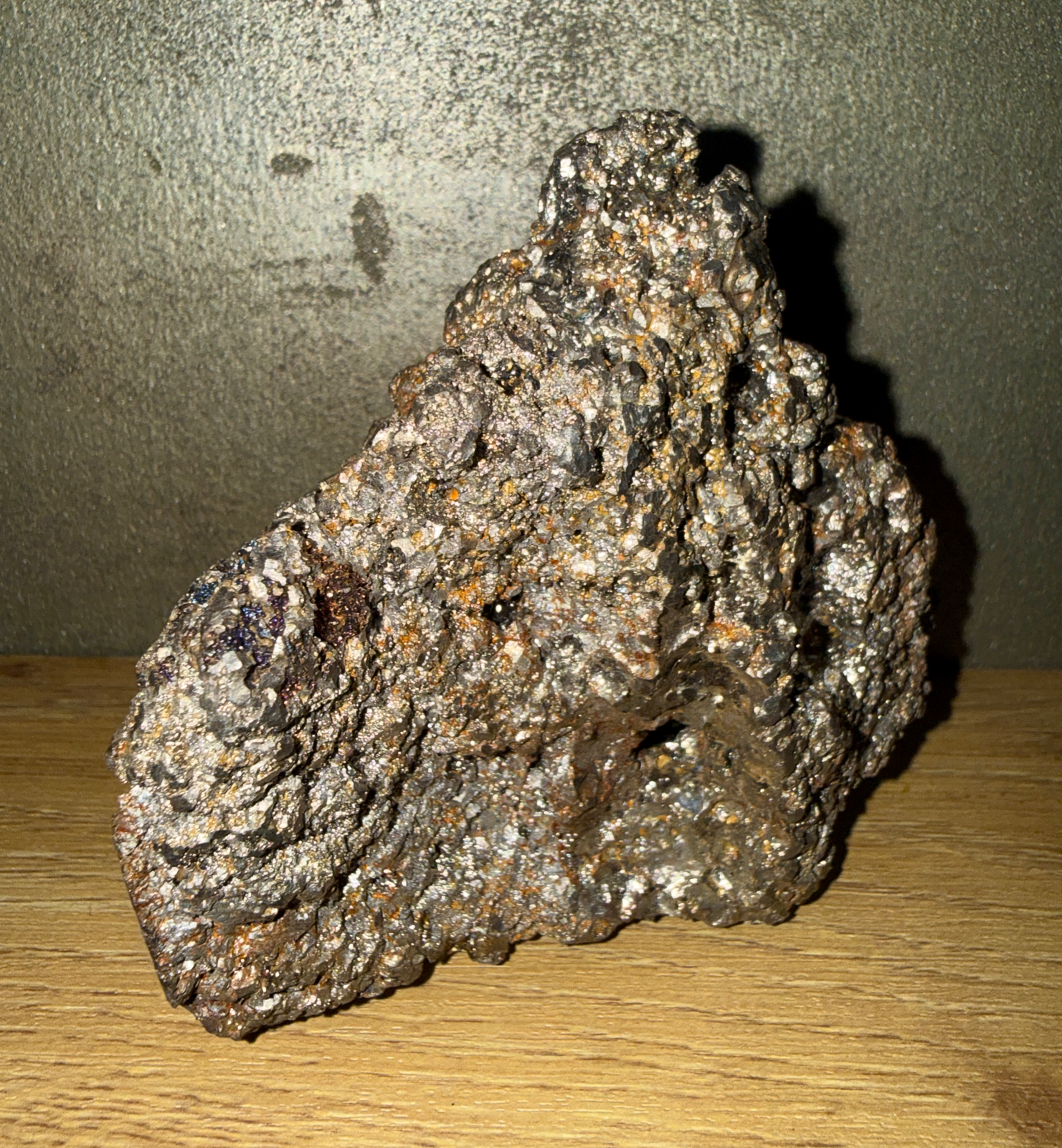 Coarse raw 1.361 kg Japanese Tamahagane Steel resting on wood, a premium samurai sword accessory.