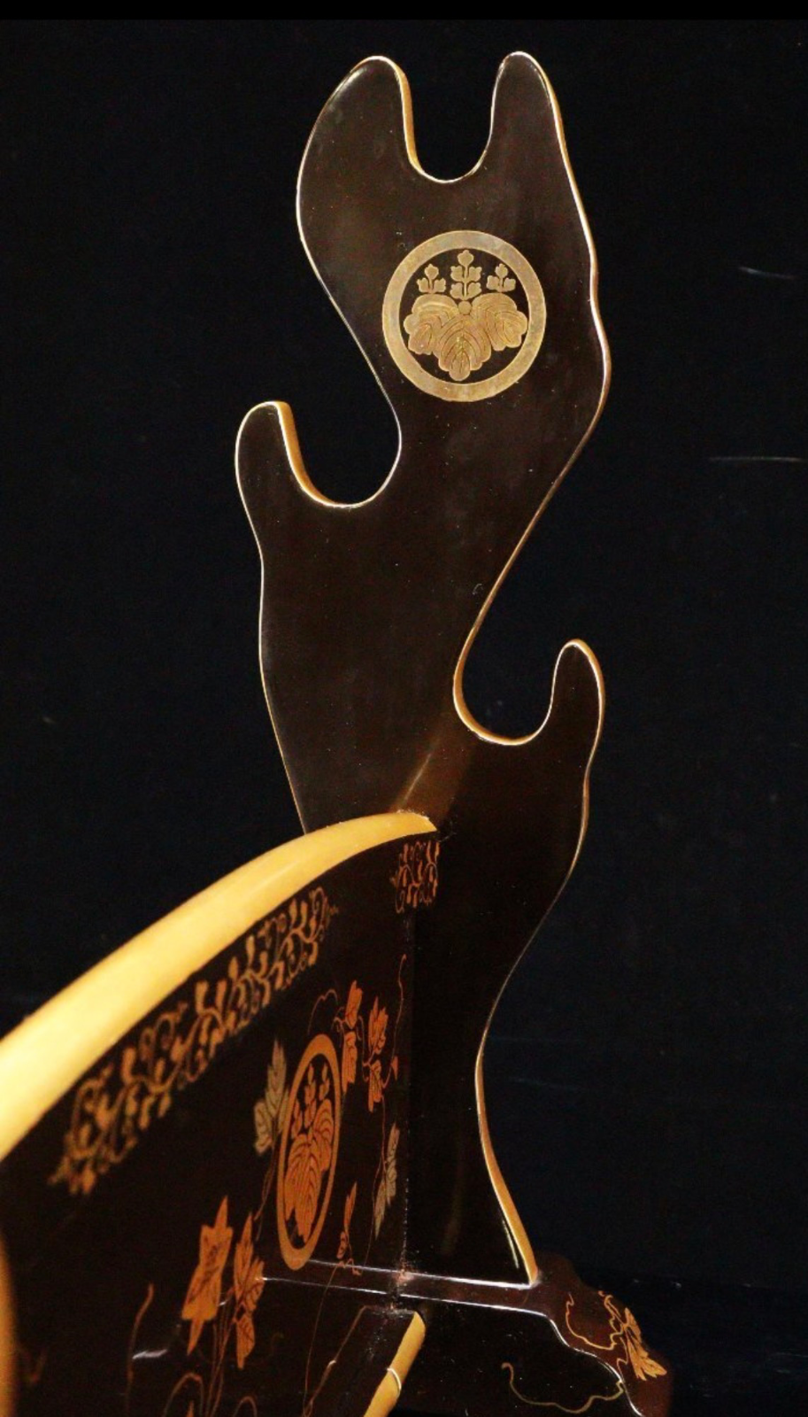 Close-up: Antique Japanese Three-Sword Kake Black Lacquer, Gold Maki-e & Paulownia Mon, featuring katana stand detail