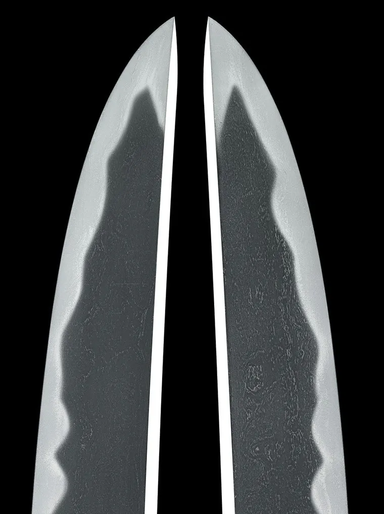 Close-up of a high-end Nidai Muramasa Katana blades showing the hamon and texture on a black background