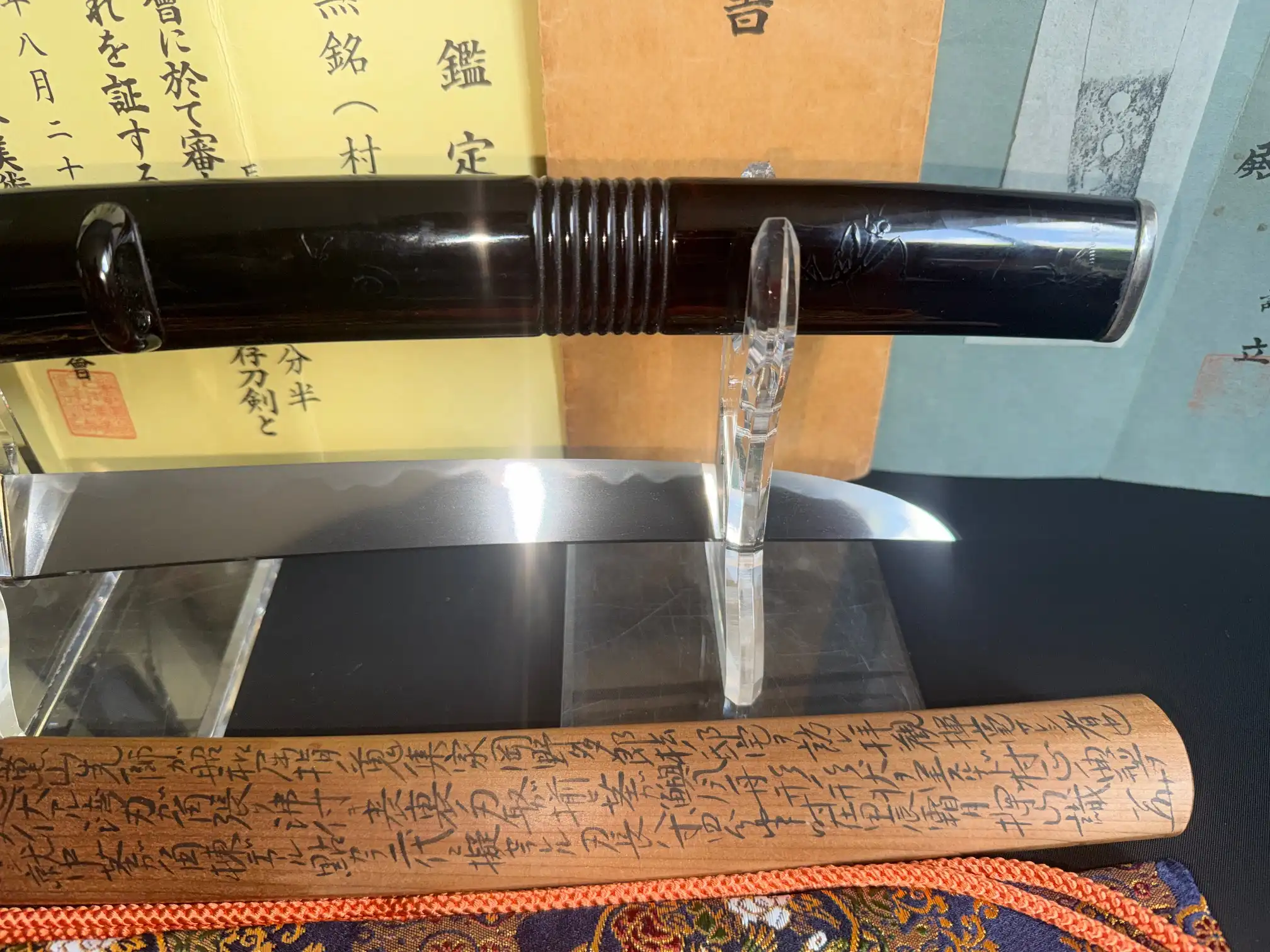 Nidai Muramasa Katana with black saya, gleaming blade, and intricate Sayagaki by Tanobe Sensei