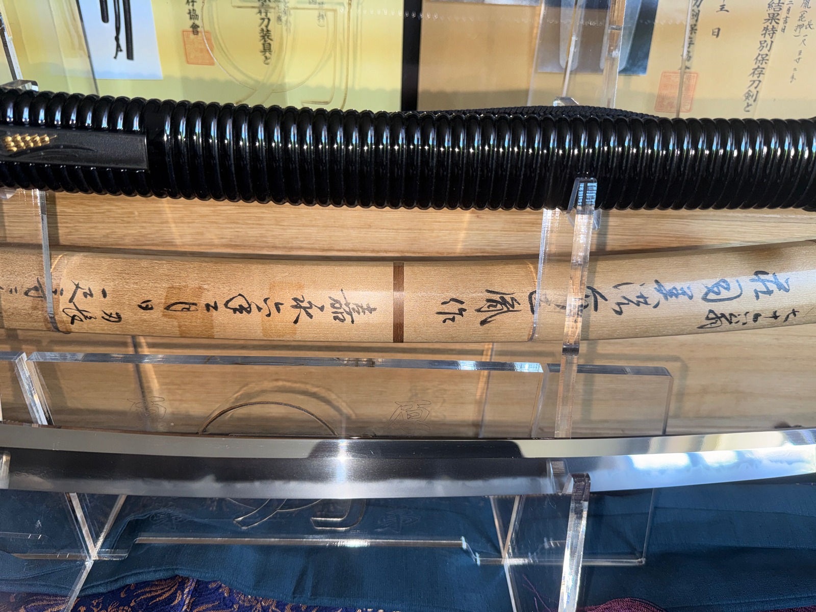 Naotane’s Final Known Daishō katana, with black lacquered saya and a close-up of the polished blade edge