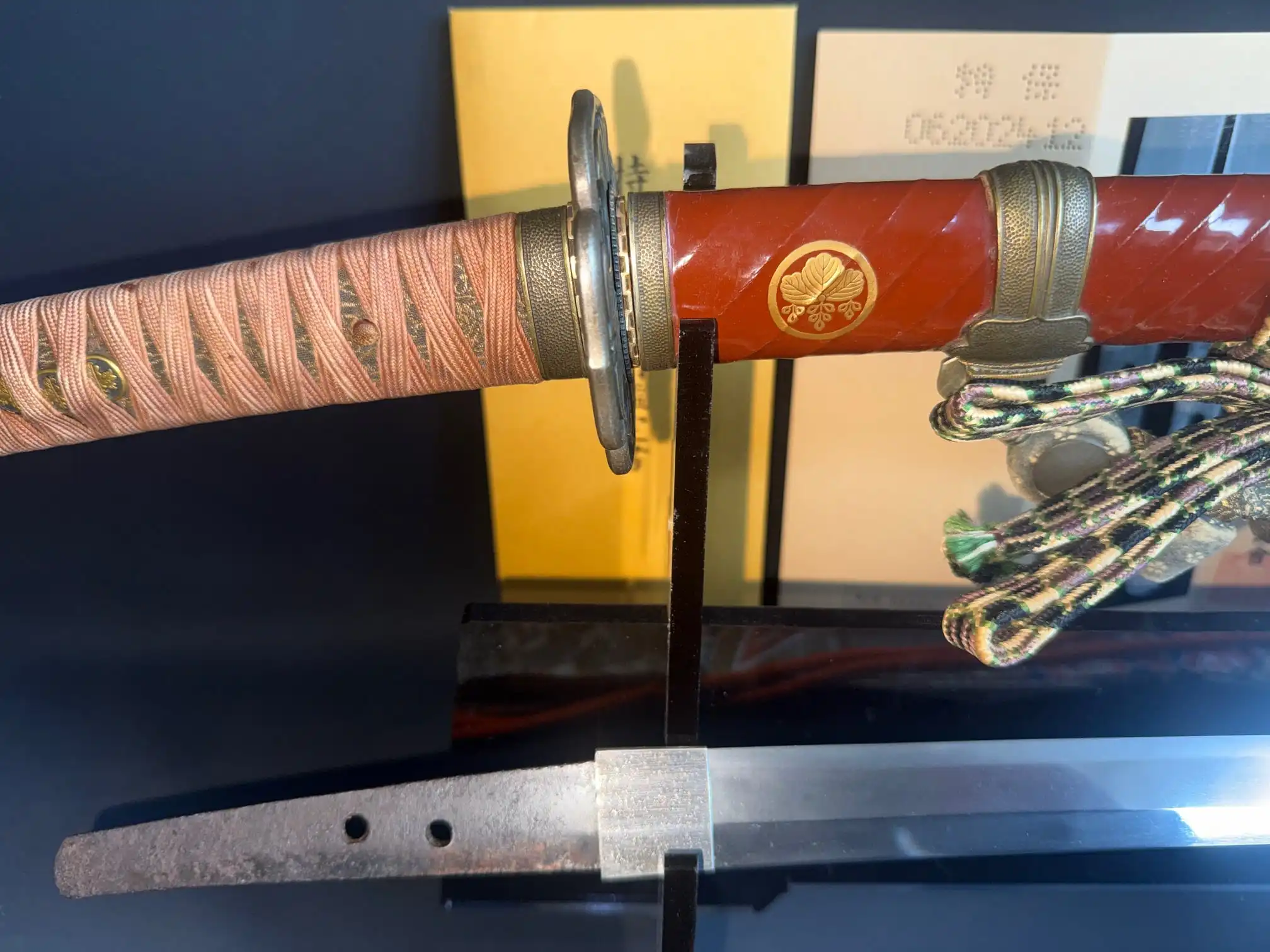 Nanbokuchō Tachi Hidemitsu Katana with pink tsuka ito, red saya with crest, and exposed tang