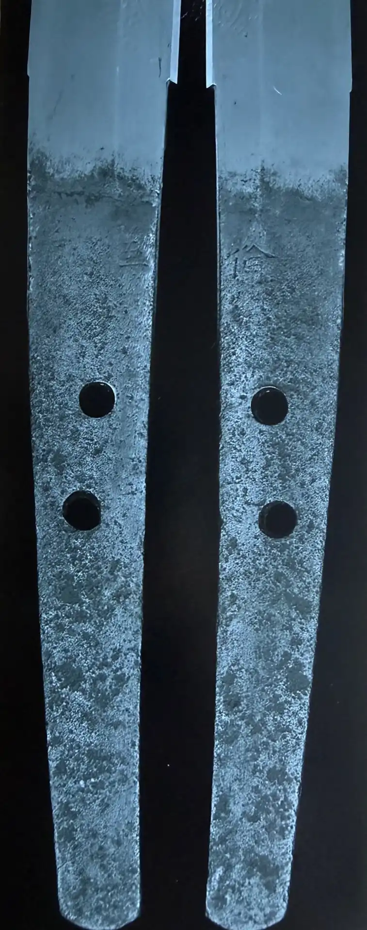 Close-up of the rusted tangs of a Katana, Nanbokuchō Tachi Hidemitsu, showing signature and two mekugi-ana