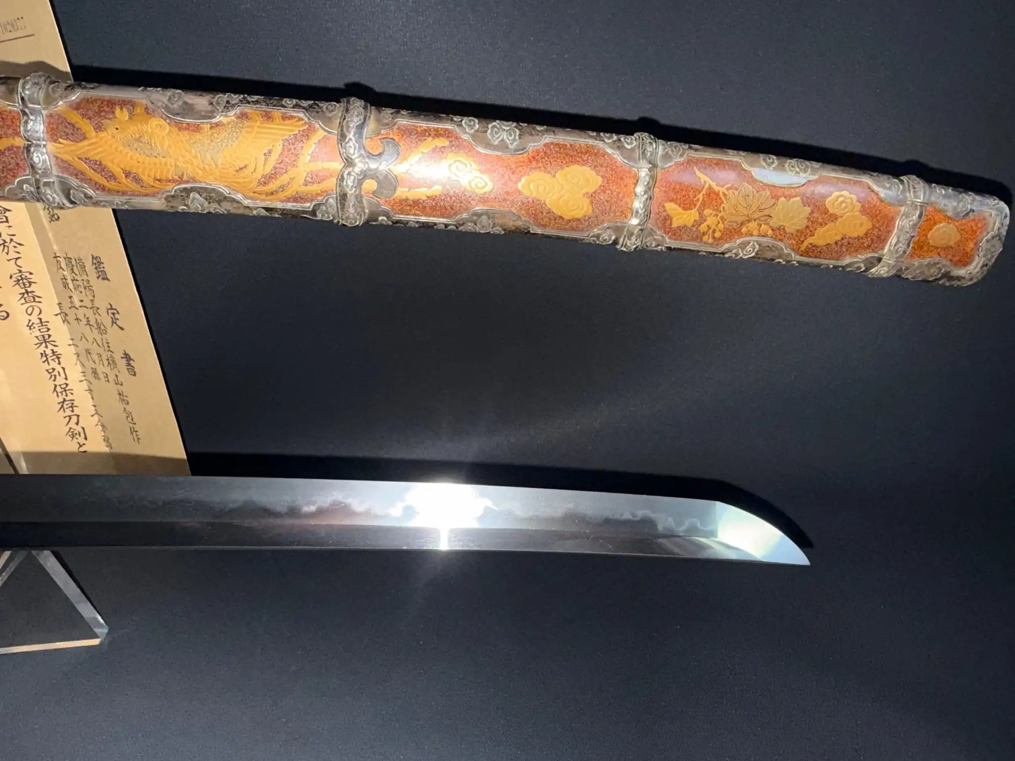 Detail of the ornate saya and polished blade of the Tachi Yokoyama Sukekane Katana.