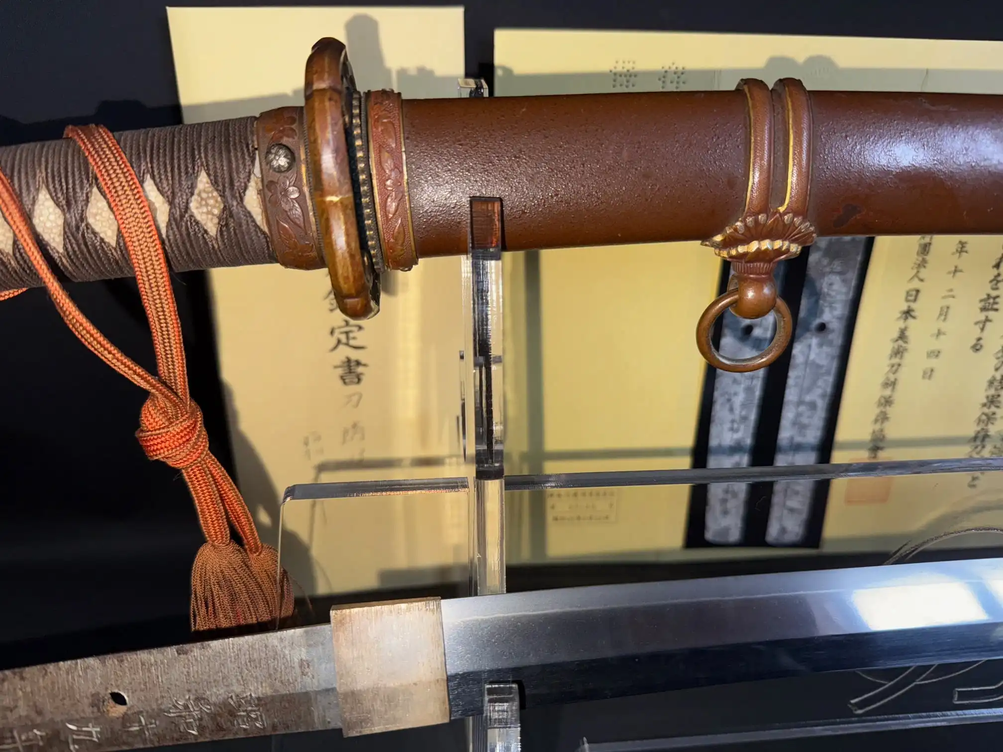 Yasukuni Gendaitō Yasunobu katana with ornate brown scabbard, hilt and exposed tang