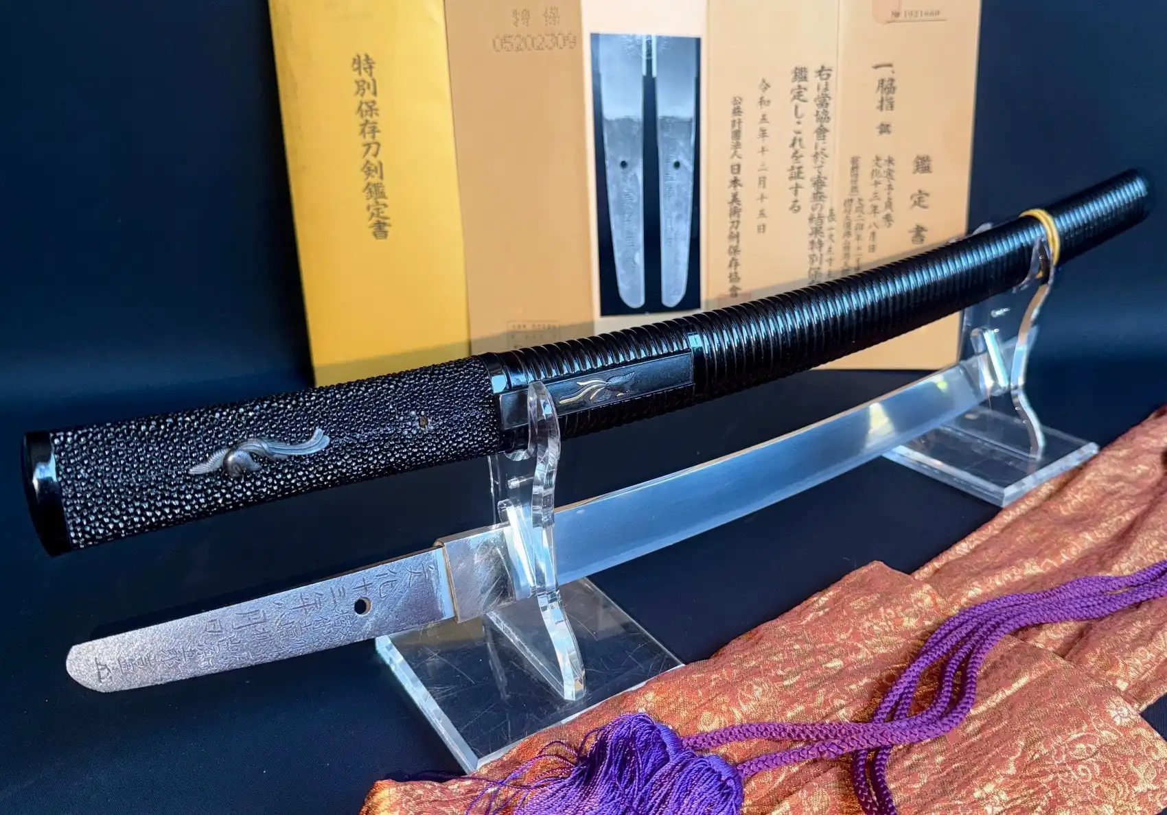 Suishinshi Masahide Wakizashi, blade and scabbard on display with certificates, side view