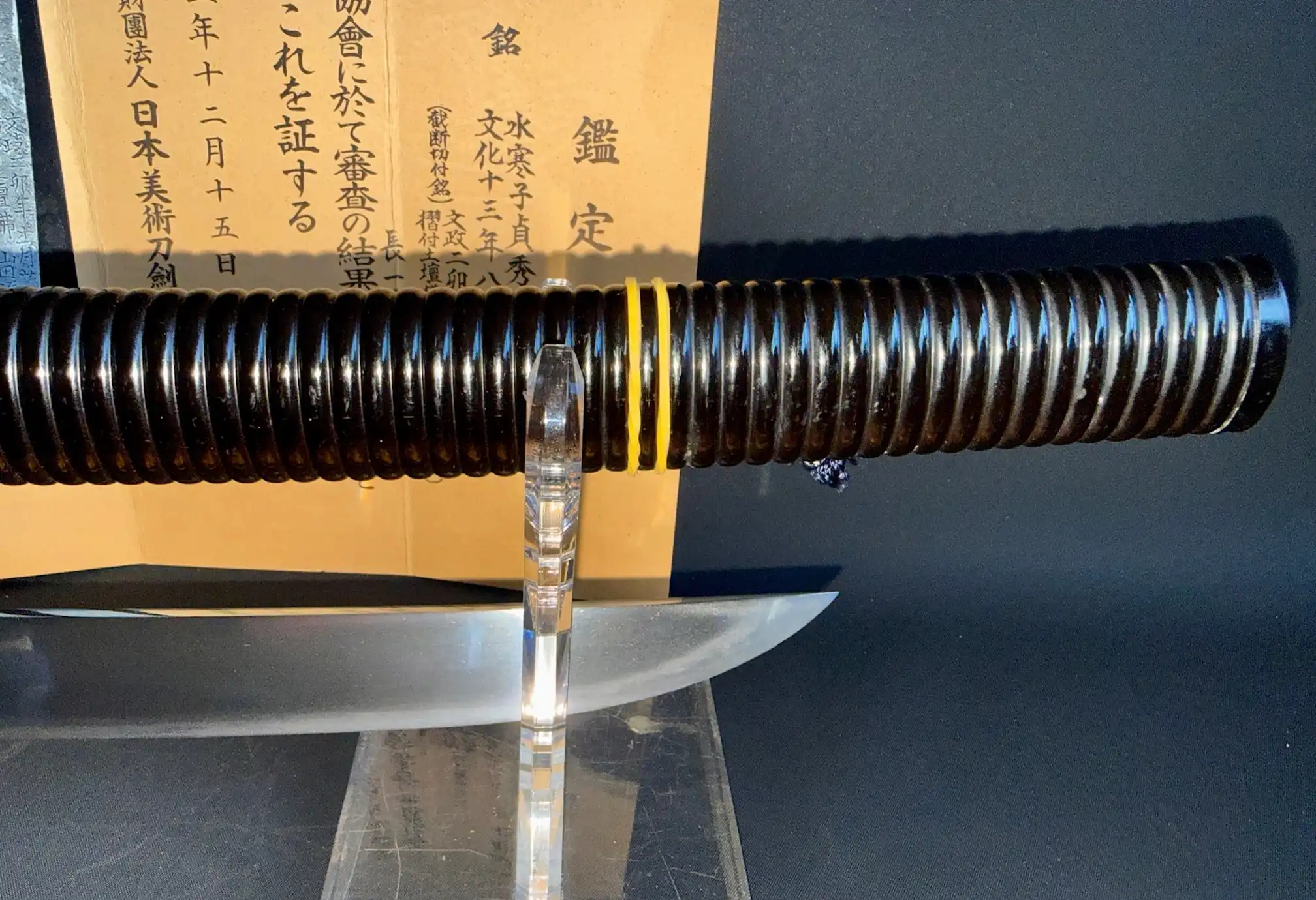 Suishinshi Masahide Wakizashi blade with scabbard, NBTHK Tokubetsu Hozon certificate visible in background