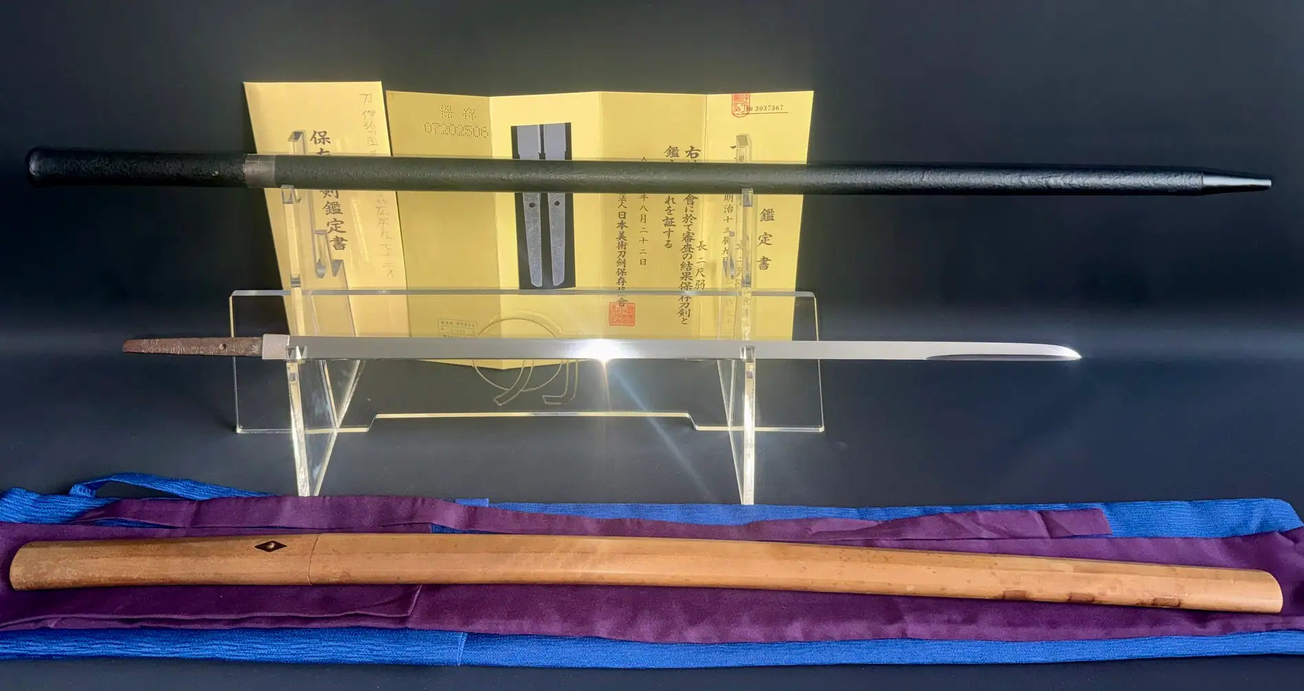 Meiji-period Shikomizue Sword Cane katana by Giho-sai Hirofusa, displayed with blade unsheathed.