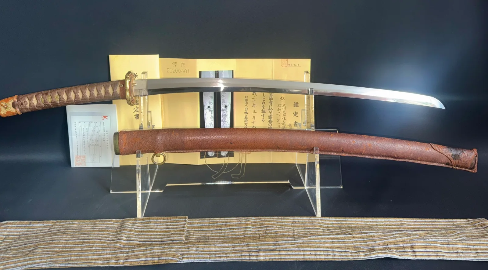 Chōunsai Shigemitsu Katana 1945 Japanese sword, with scabbard & paperwork, top-down view