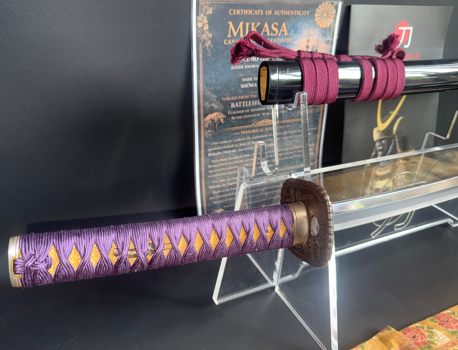 Gendaitō Battleship Mikasa katana close-up of handle and scabbard with Mikasa certificate in background