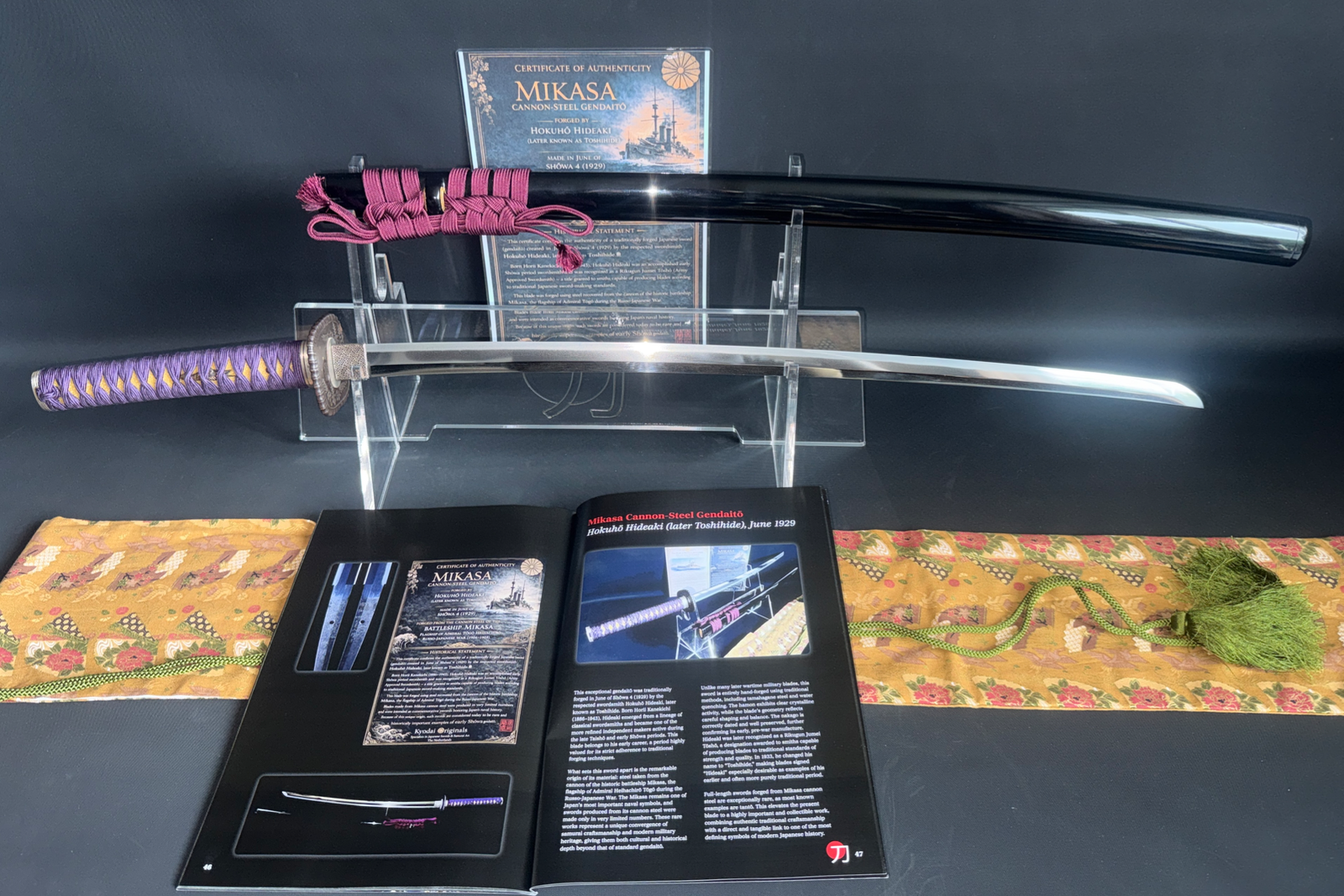 Gendaitō Battleship Mikasa Katana with purple wrapped tsuka, on stand with scabbard, COA, and book.