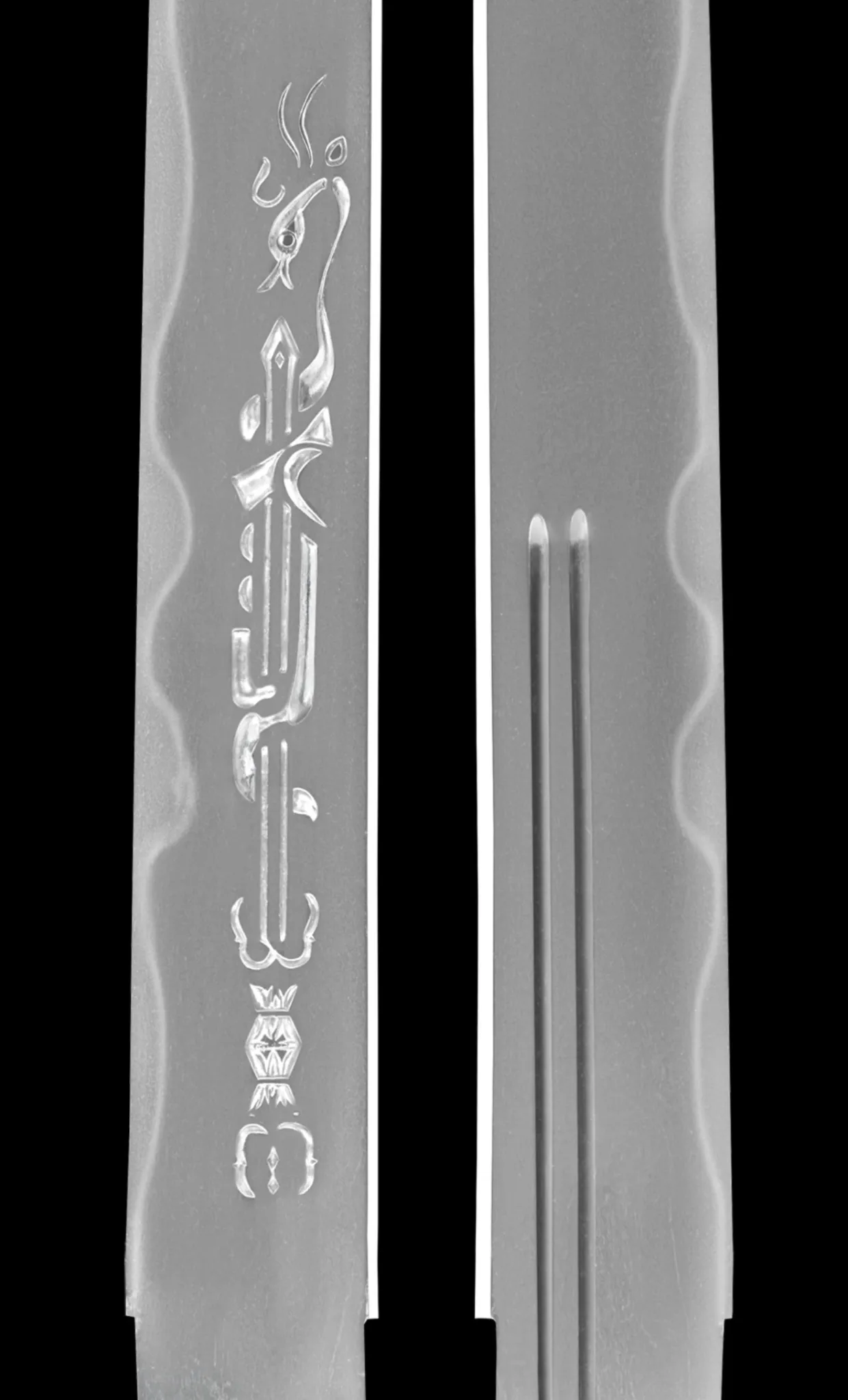 Close-up of a NBTHK Jūyō Tōken Tantō by Heianjō Nagayoshi, showing detailed blade engraving and grooves