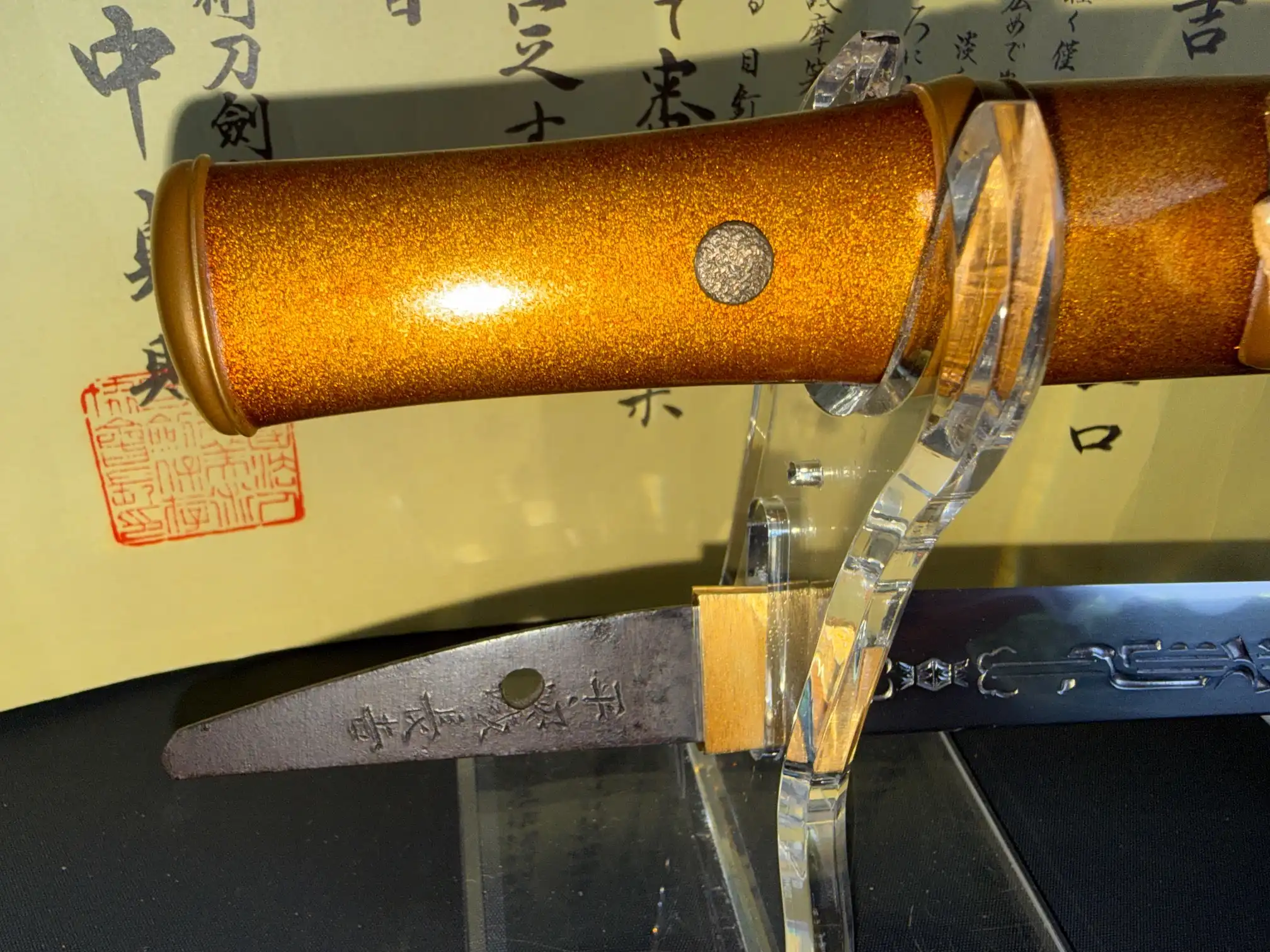 Close-up of the polished nakago of the NBTHK Jūyō Tōken Tantō by Heianjō Nagayoshi, revealing its signature.