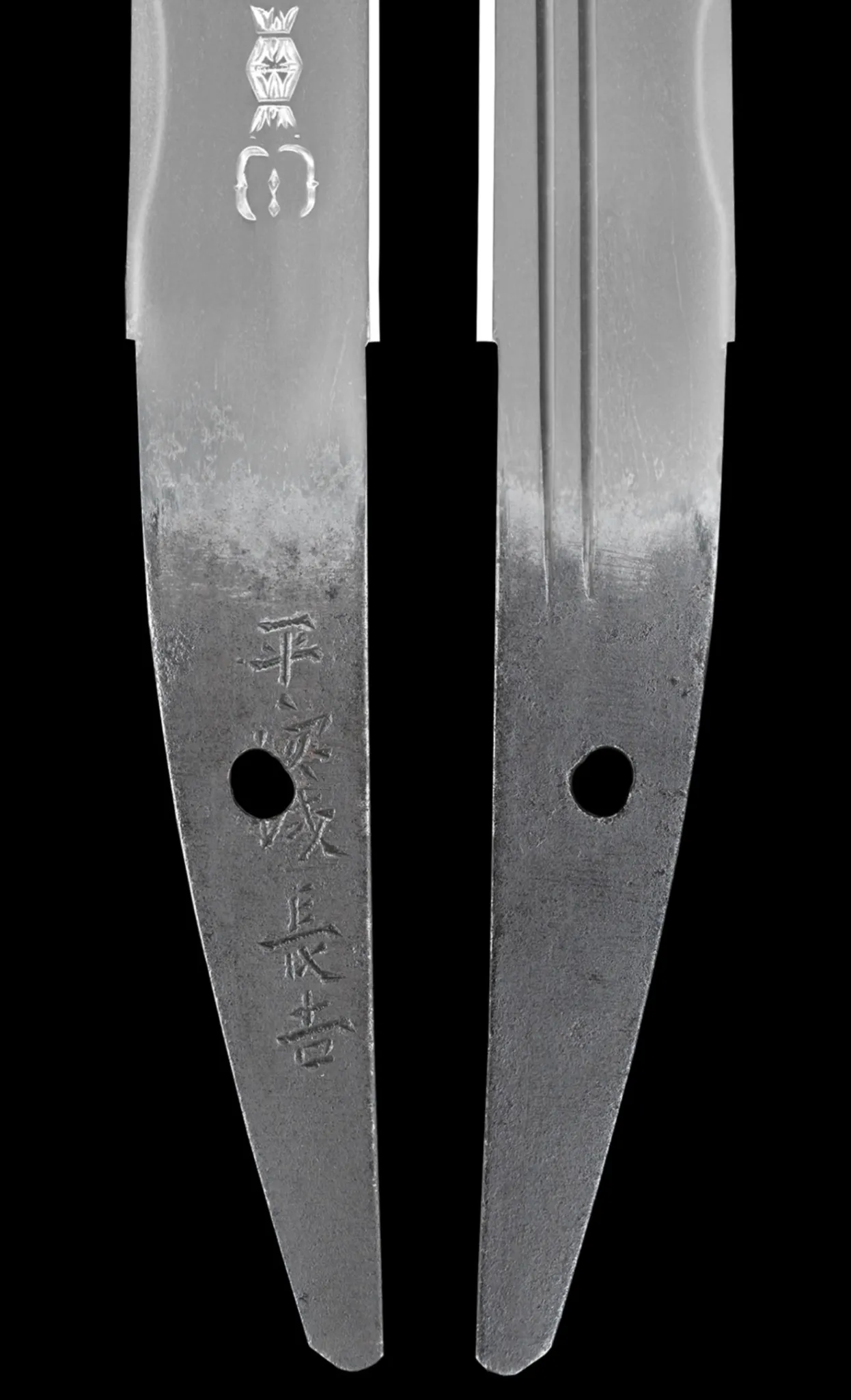 Close-up of a NBTHK Jūyō Tōken Tantō by Heianjō Nagayoshi showing intricate smith's marks on tang and spine