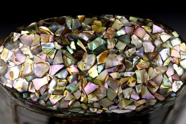 Top view of Edo Japanese Inro accessory covered in iridescent mother-of-pearl shell fragments