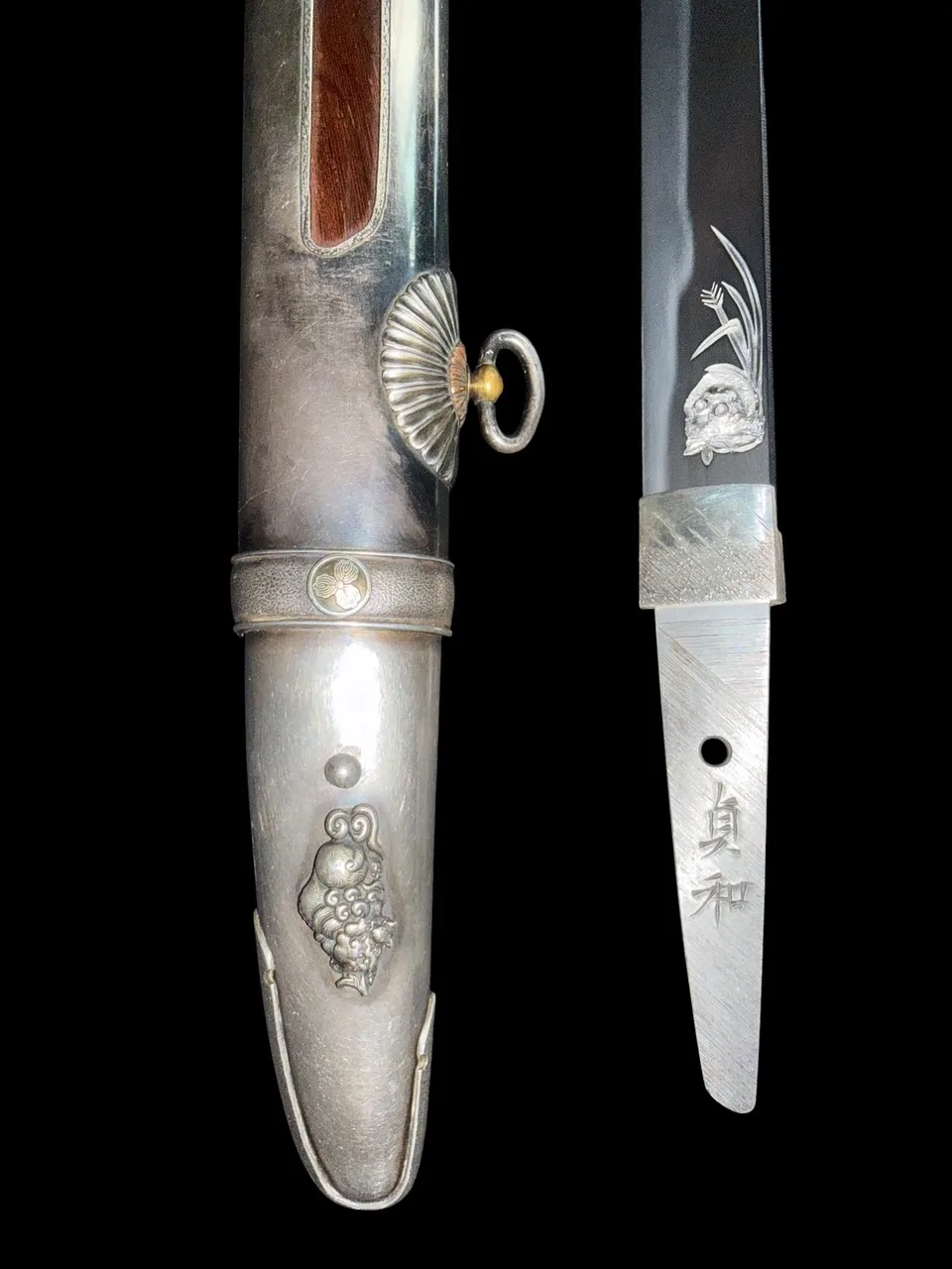 Silver Skull Tanto by Ryūjin Minamoto Sadakazu, silver saya and nakago with skull, grass, and grape motifs