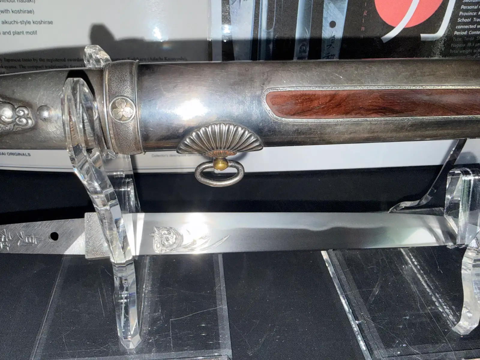 Silver Skull Tantō by Ryūjin Minamoto Sadakazu, blade visible with engraved skull motif, silver scabbard detail