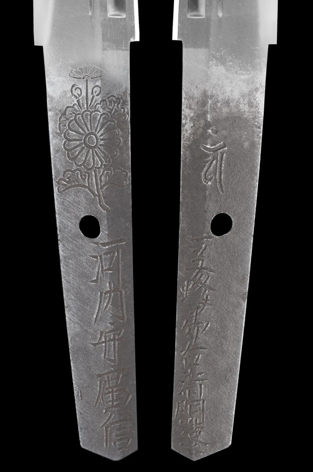 Close-up of Kawachi no Kami Hironobu Tantō katana tangs, one with Imperial Kikumon engraving, 1661 period