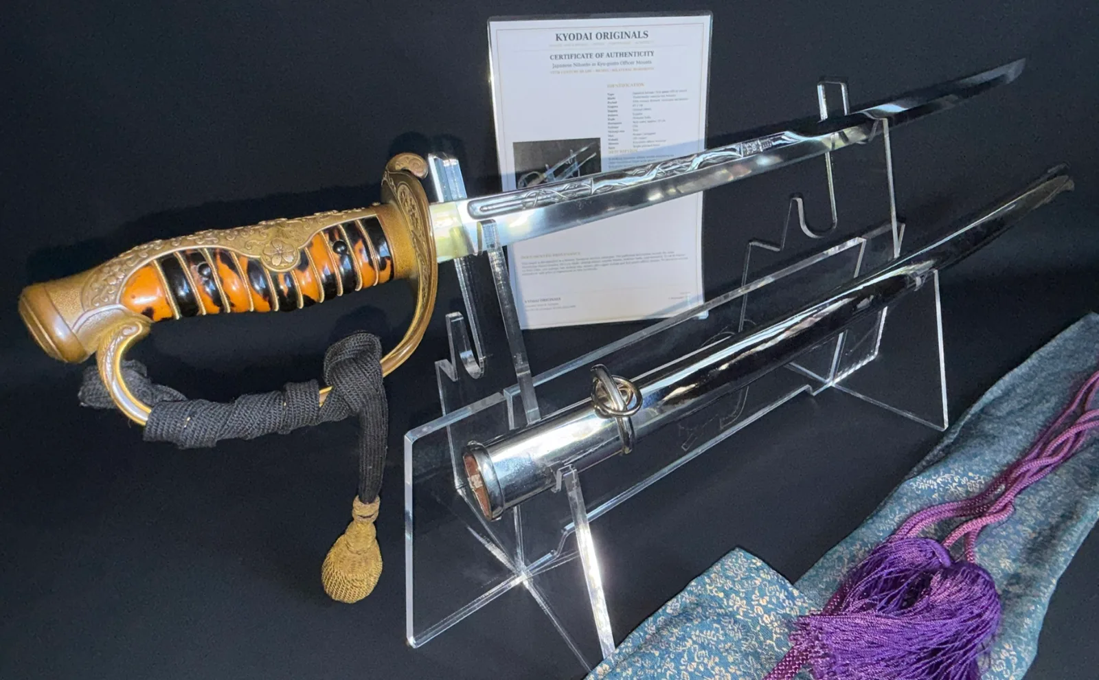 Japanese General Officer's Kyū-Guntō katana, ornate handle, horimono blade, and scabbard displayed on stand