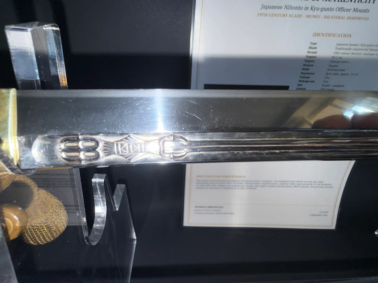 Kyū-Guntō katana blade close-up, showing engraved horimono details on 19th C Gassan School Nihontō.