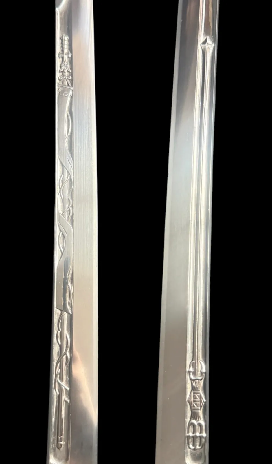 Close up of Gassan School Nihontō katana blade with ornate horimono carving, detail of a Japanese General Officer's Kyū-Guntō