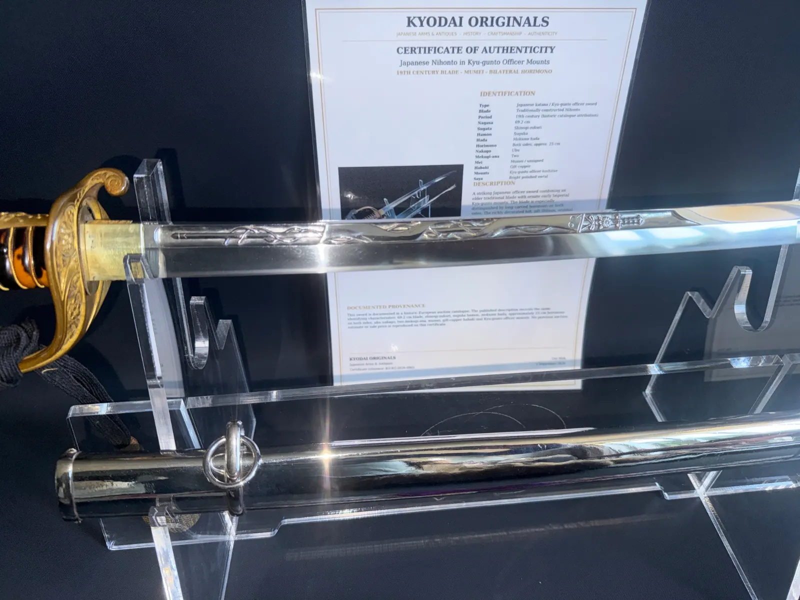 Japanese General Officer’s Kyū-Guntō katana, Gassan School Nihontō blade with horimono visible, from the hilt.