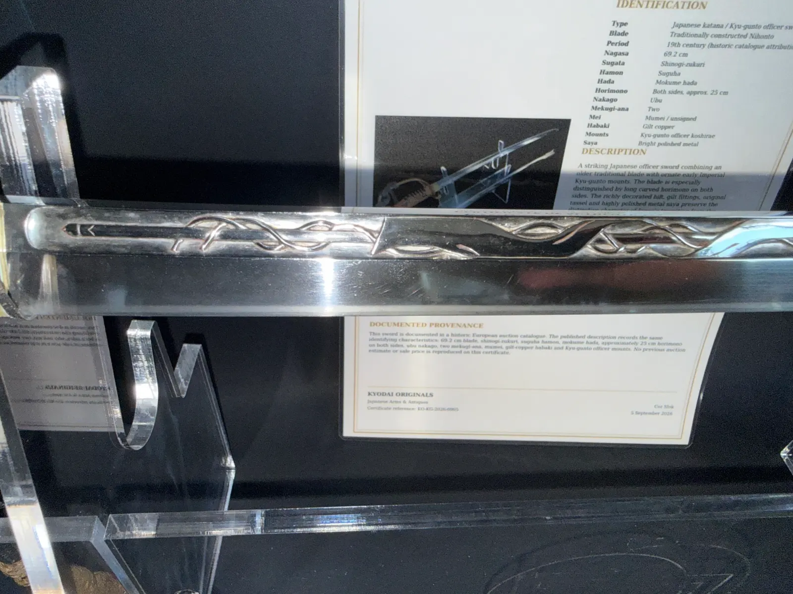 Japanese General Officer’s Kyū-Guntō katana, close-up of saya with ornate metal Horimono detail.