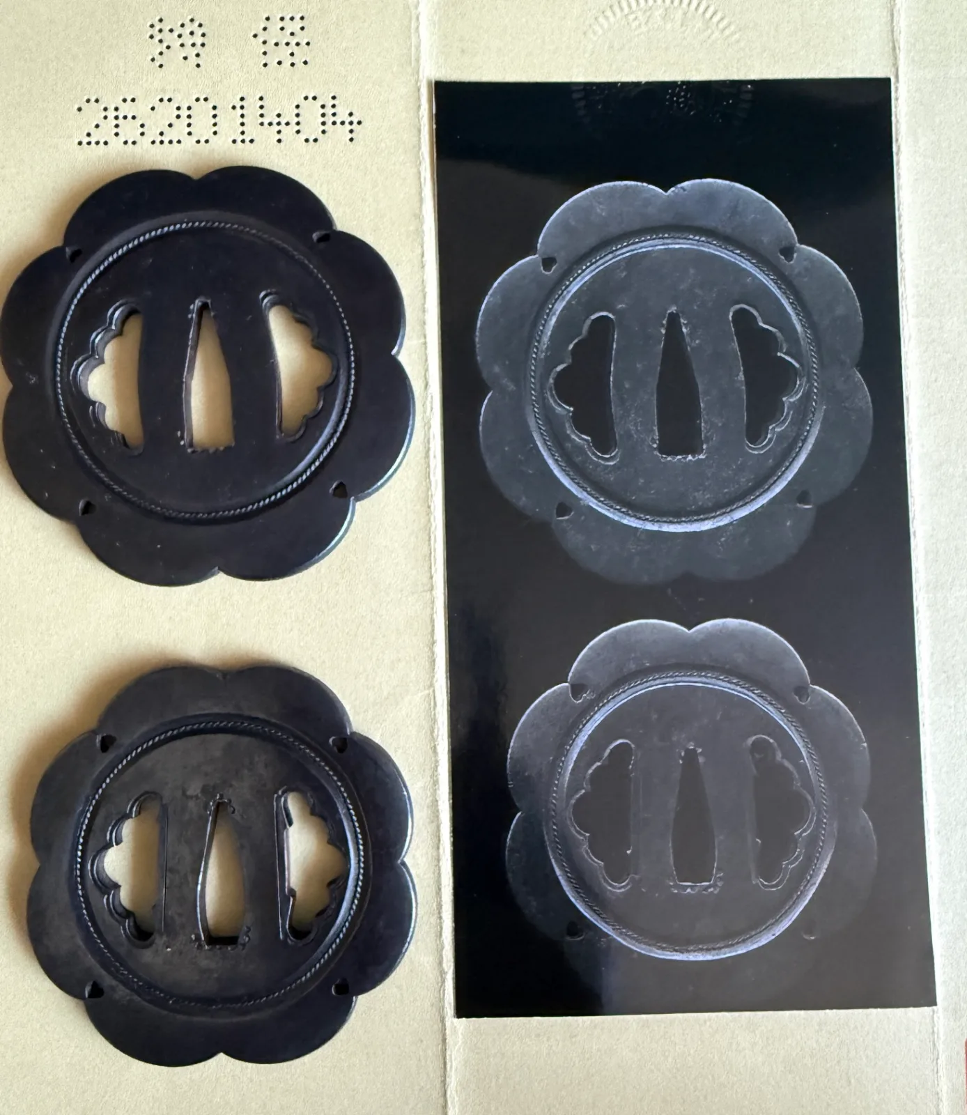 Kamiyoshi Fukanobu Daishō Tsuba Set shown on card with matching reference photo, elegant Edo period sword guards