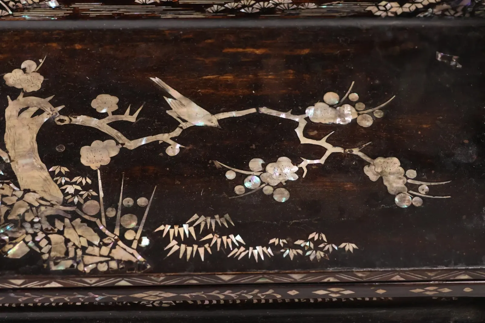 Close-up of raden bird and plum blossom inlay on Antique Japanese Silver Kake Katana Kake Accessories from Meiji Period