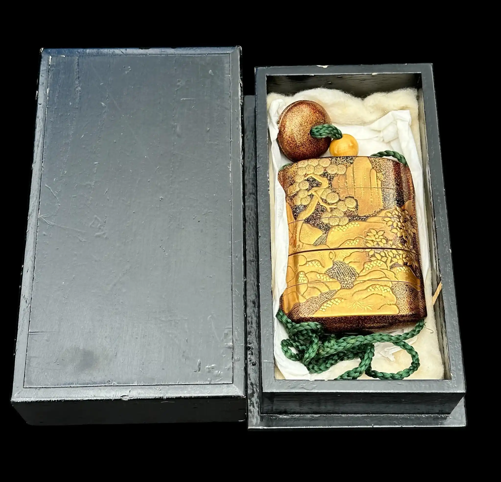 Antique Inro 1840 Makie accessory, golden with Wajima lacquer art, green cord, in box, top view