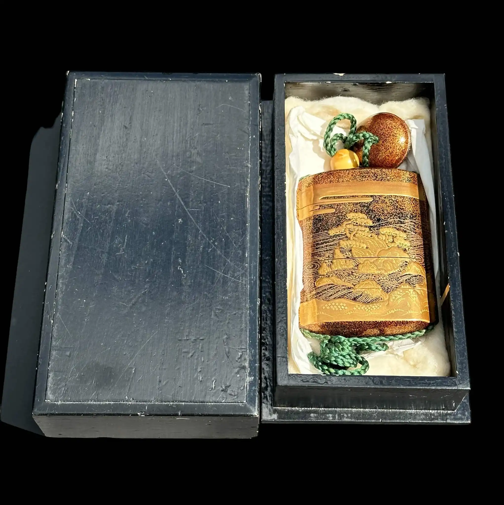 Antique Inro 1840 Makie accessory in a box, front view showcasing gold lacquer art on the Japanese inro.