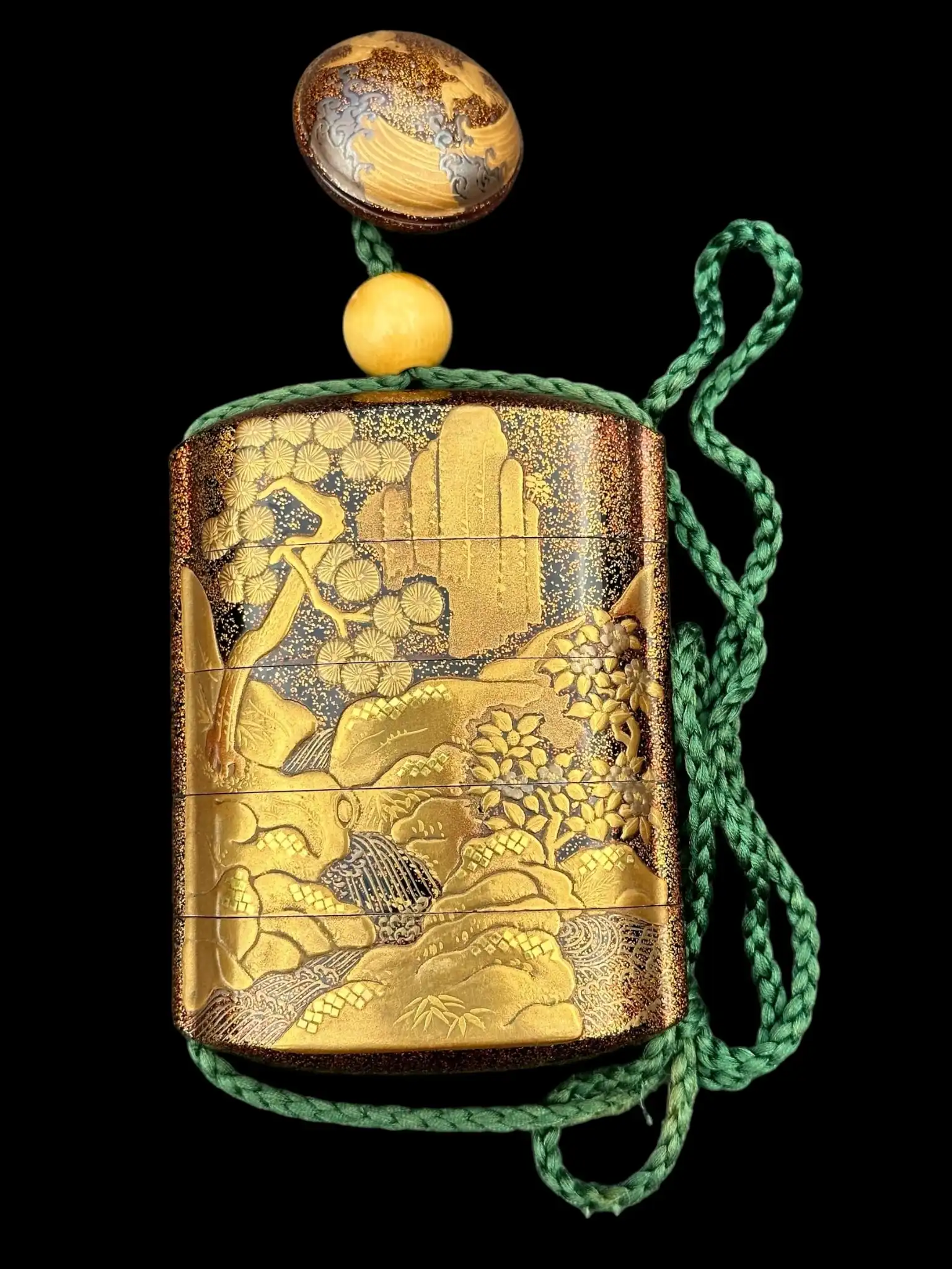 Kyodai Originals Antique Inro 1840 Makie accessory with intricate gold lacquer landscape design and green cord.