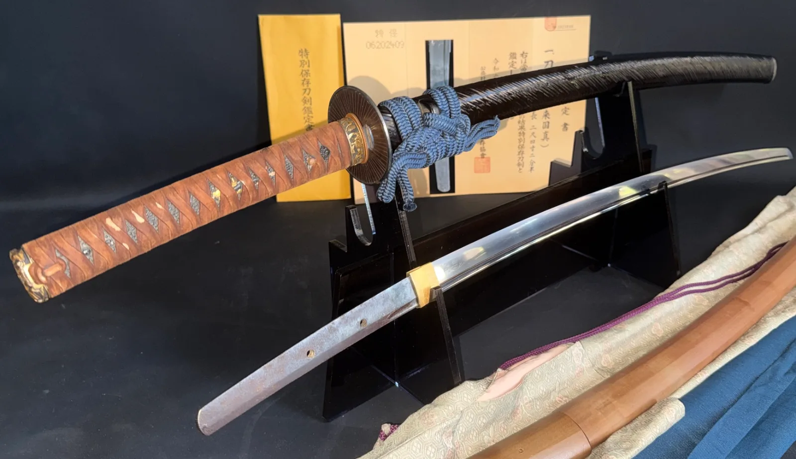 Kamakura Katana Rai Kunizane Tokubetsu Hozon, a Japanese katana with brown tsuka, displayed with blade beside saya