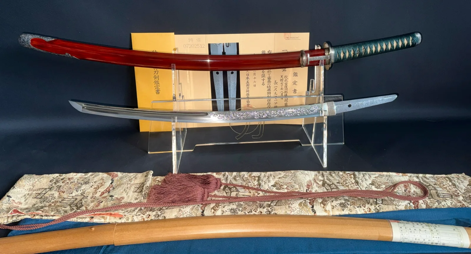 Suishinshi Masahide Wakizashi NBTHK Tokubetsu Hozon, katana blade and red lacquered scabbard, full view display