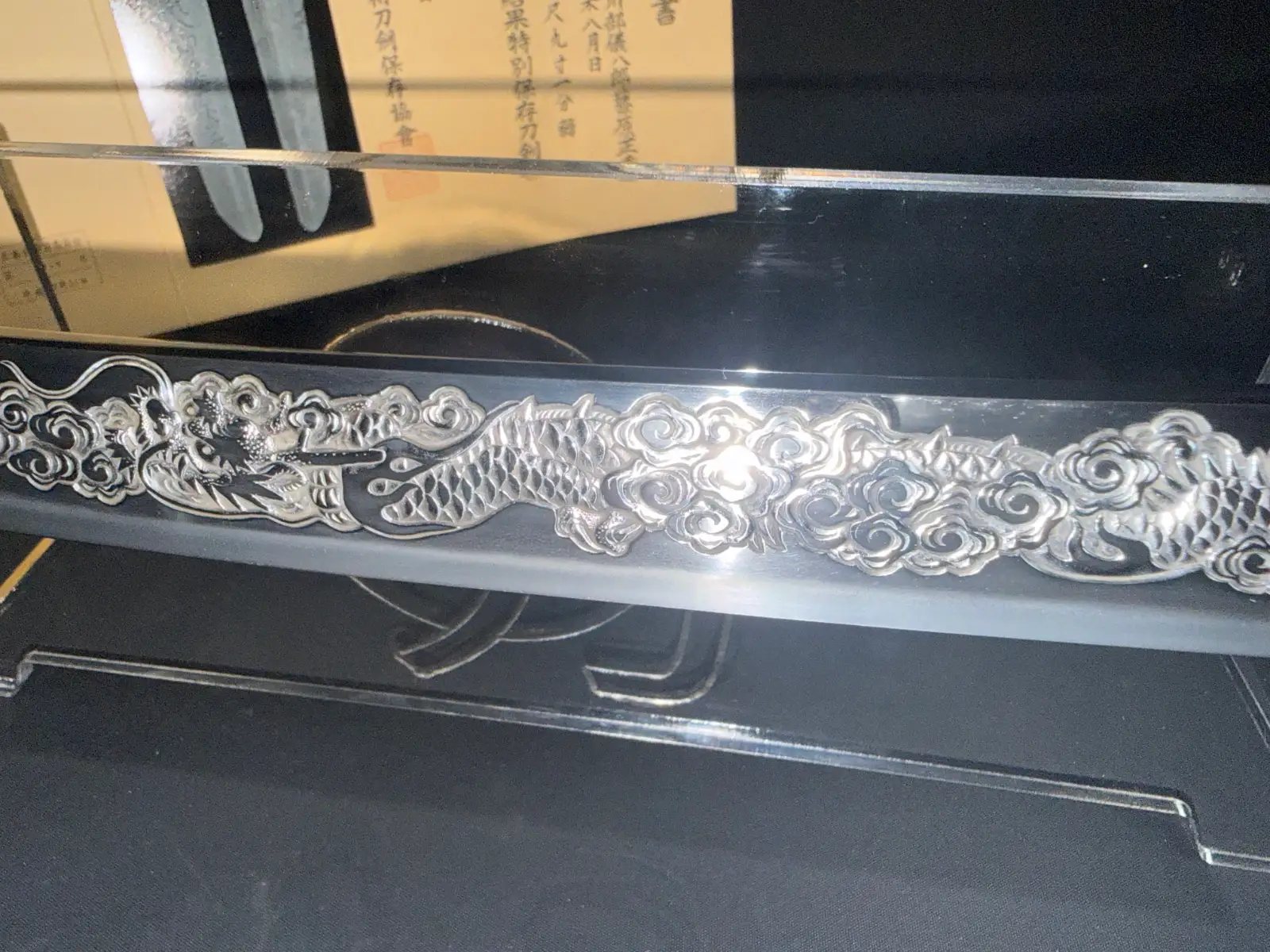 Intricate dragon carving detail on the Suishinshi Masahide Wakizashi NBTHK Tokubetsu Hozon, 1787.