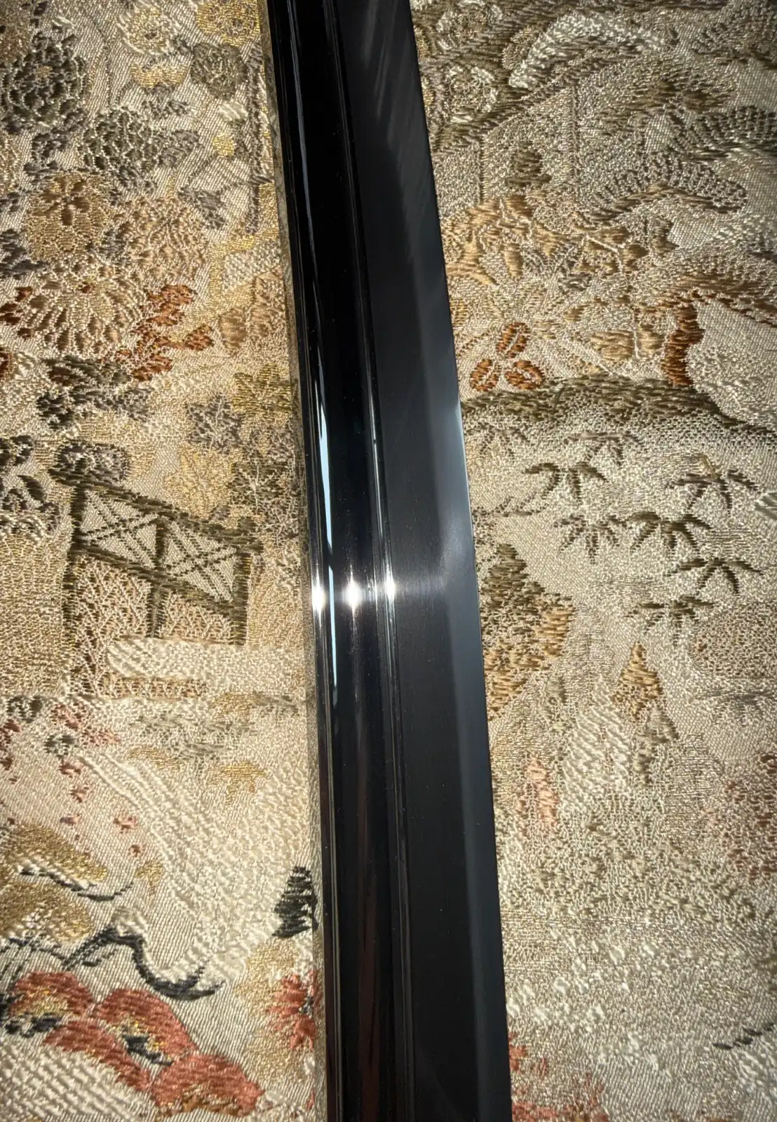 Close-up of the smooth, dark saya for the Kyodai Originals Suishinshi Masahide Wakizashi NBTHK Tokubetsu Hozon