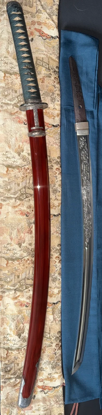 Suishinshi Masahide Wakizashi NBTHK Tokubetsu Hozon, shown unsheathed with ornate fittings and glossy red saya