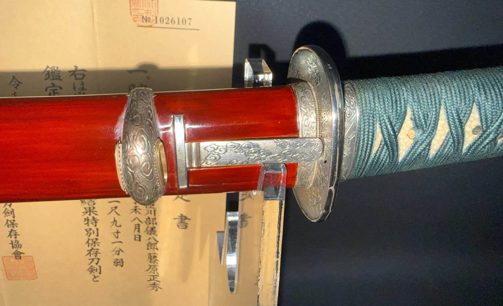 Suishinshi Masahide Wakizashi NBTHK Tokubetsu Hozon, detail of red saya and silver fuchi-kashira and tsuba