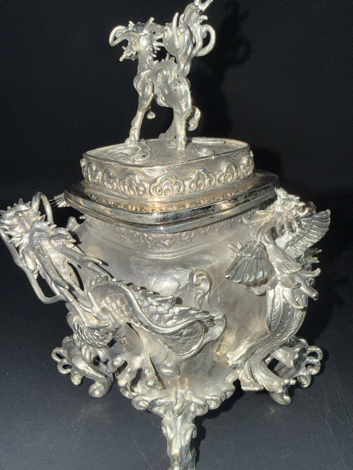 Takaoka Bronze Kōro ACCESSORIES, ornate silver incense burner with a mythical beast on top, a detailed view