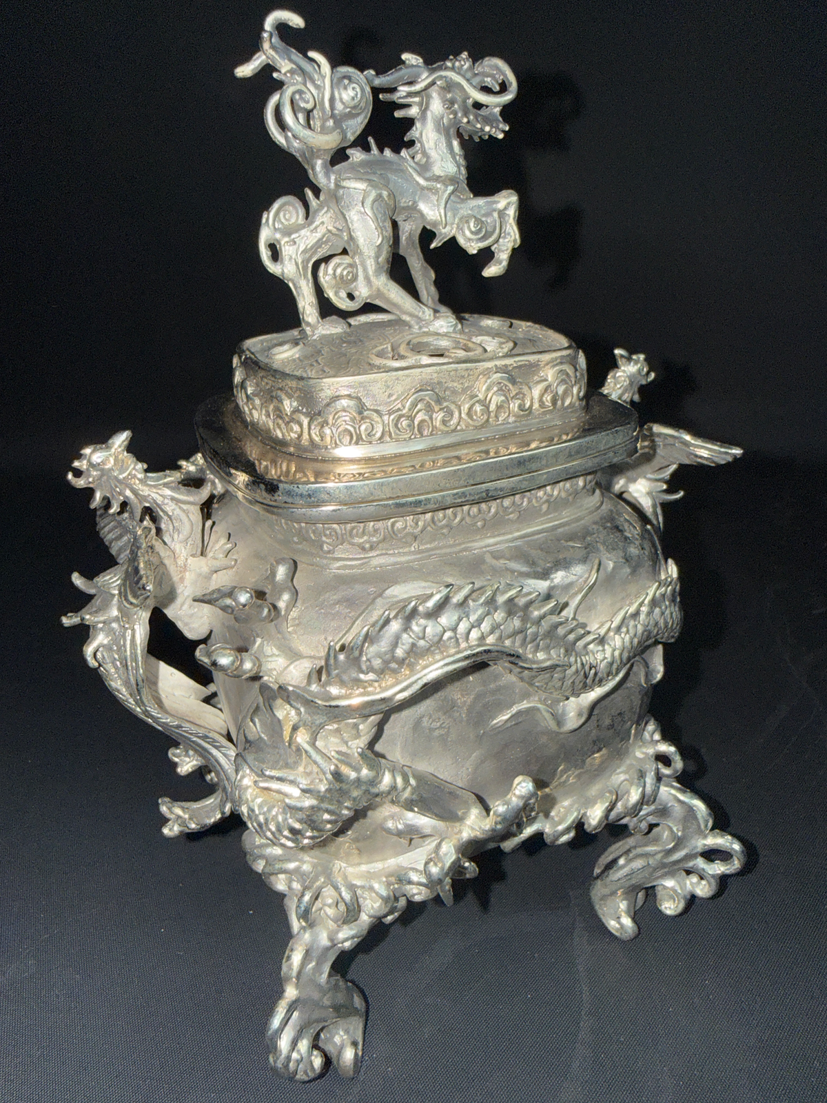 Takaoka Bronze Kōro ACCESSORIES, ornate silver incense burner with a kirin top and dragon details, front view