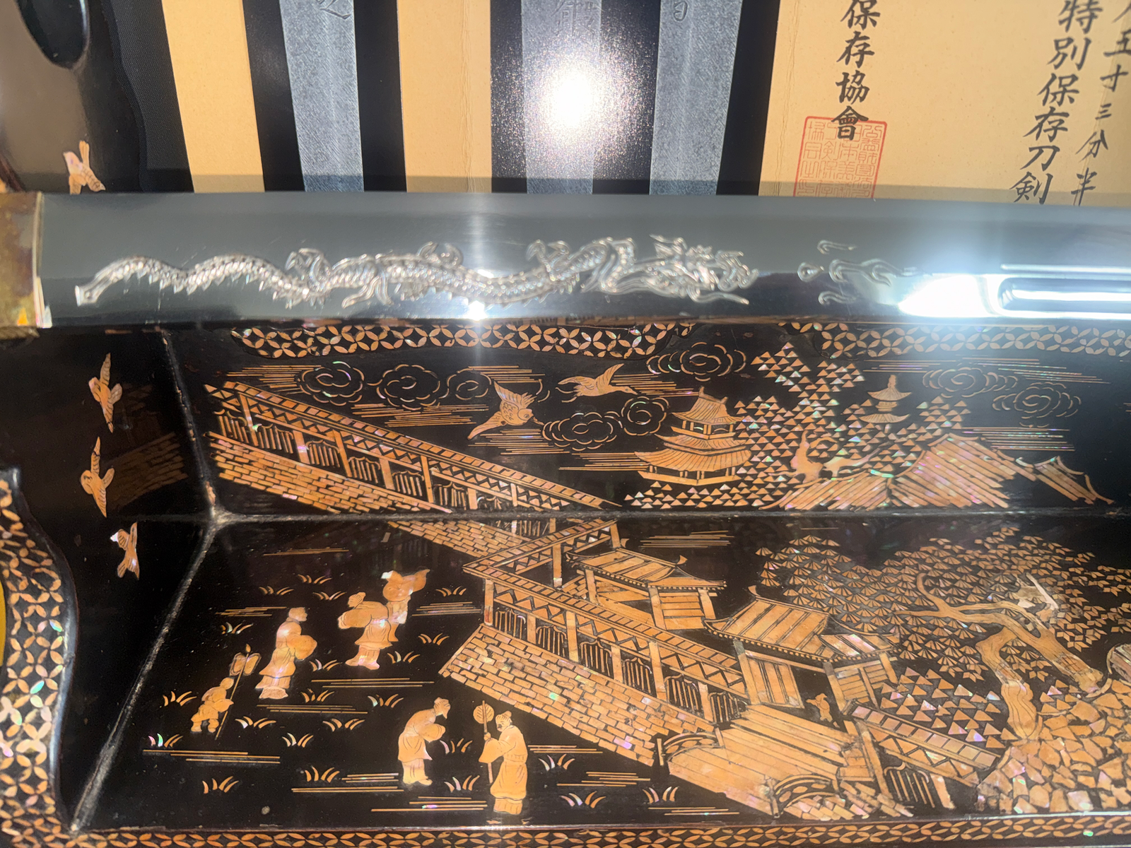 Japanese Masterpiece Katana by Gassan Sadakazu, blade with dragon horimono above an ornate raden lacquered saya
