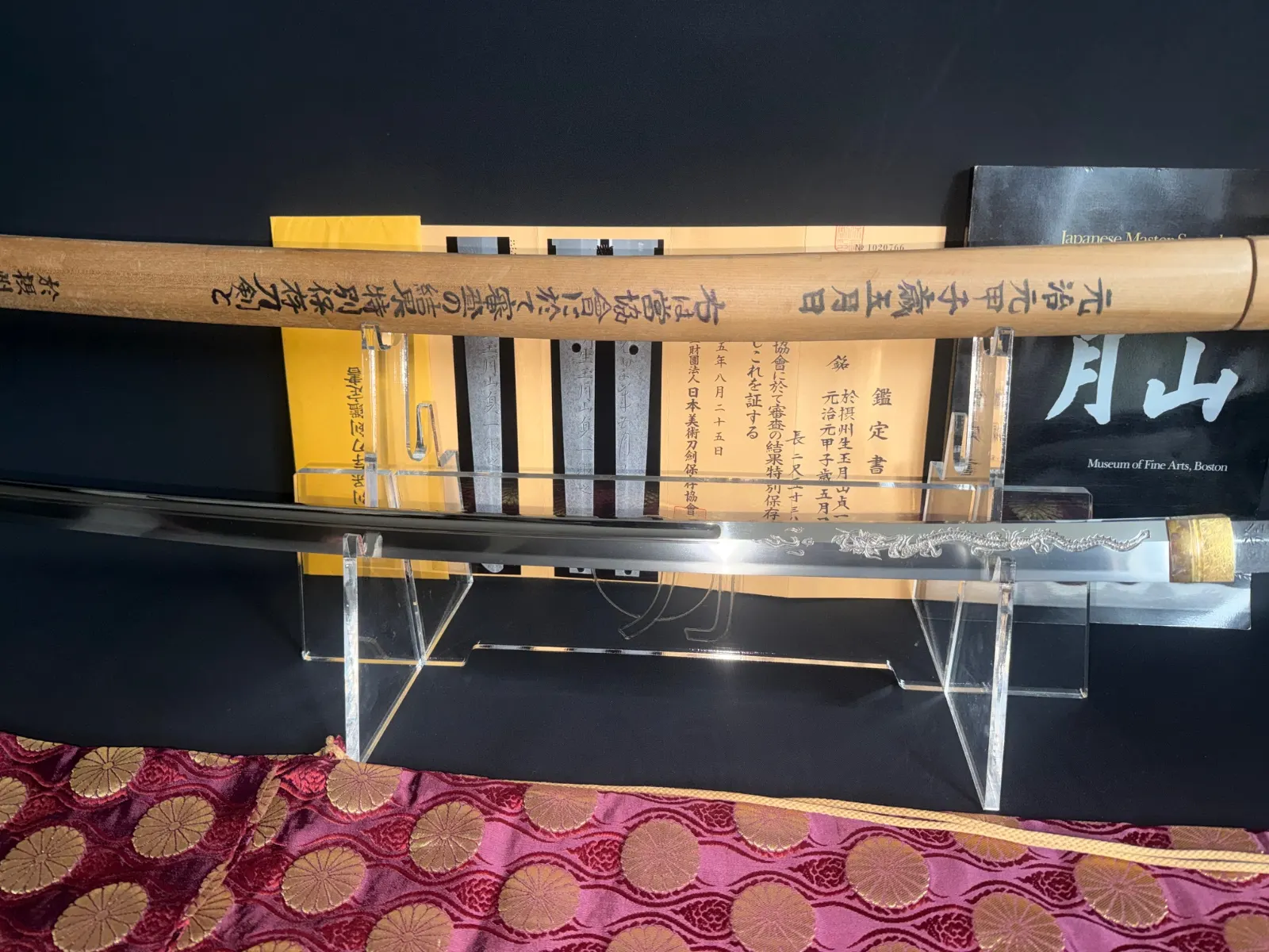 Japanese Masterpiece Katana by Gassan Sadakazu, NBTHK Tokubetsu Hozon, displayed with documents and ornate habaki