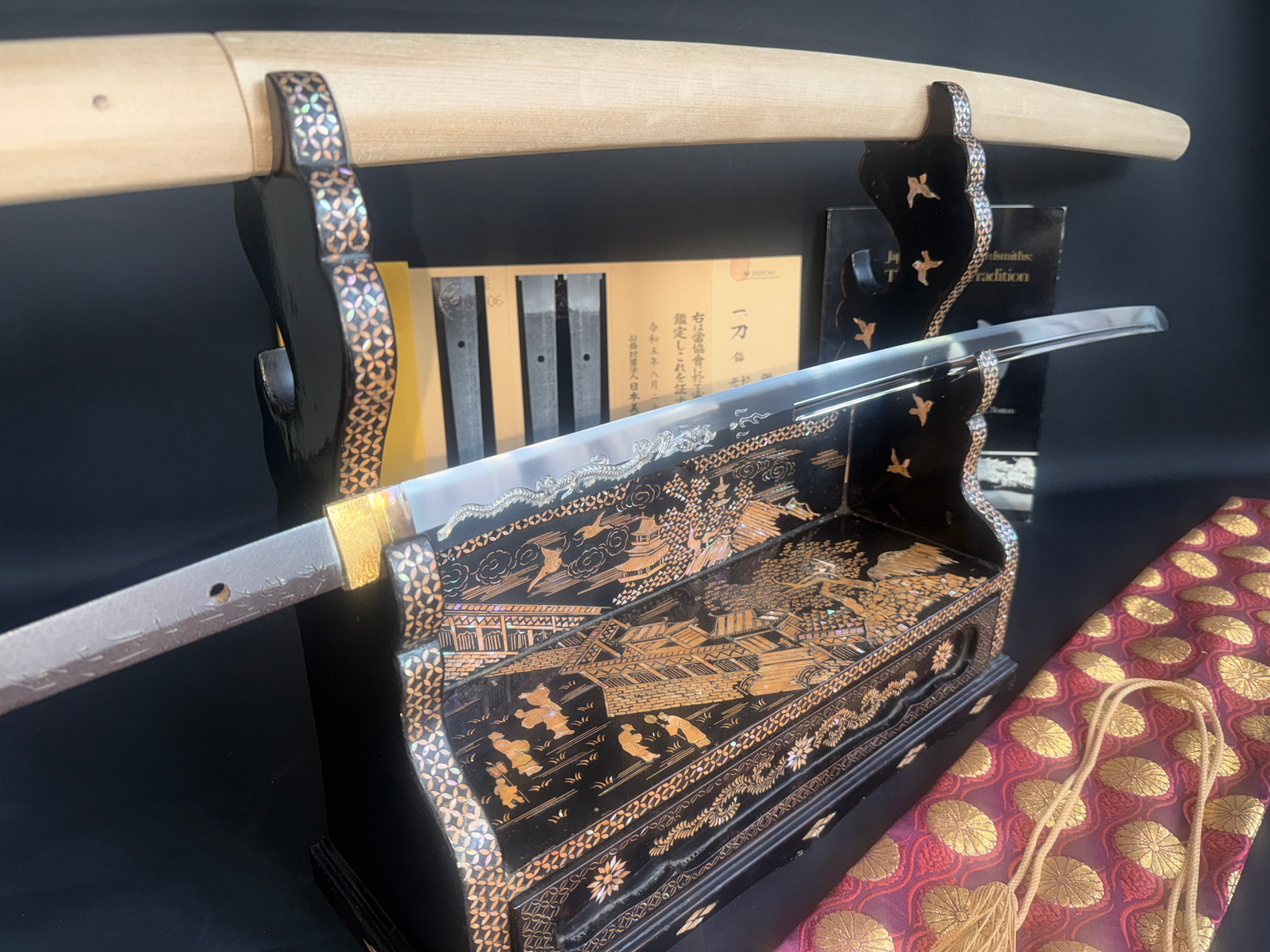 Japanese Masterpiece Katana by Gassan Sadakazu with NBTHK Tokubetsu Hozon, displayed on an ornate stand