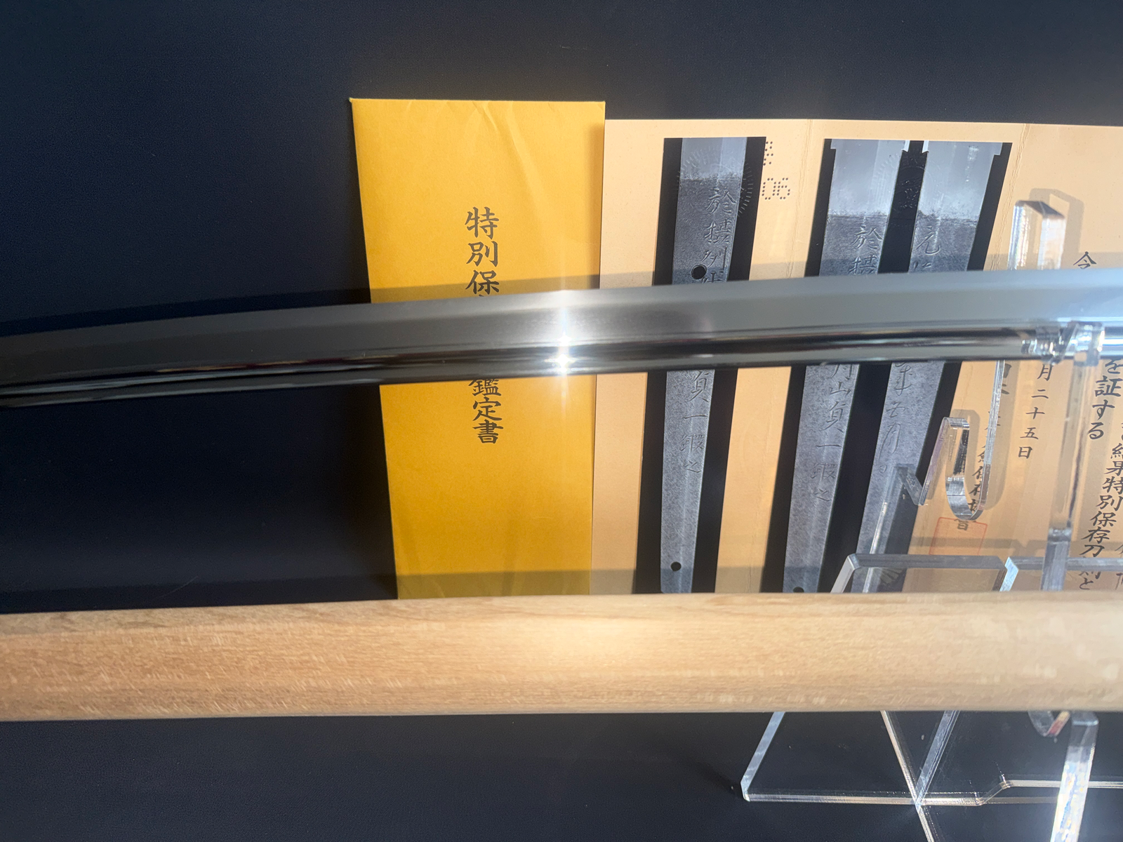 Gassan Sadakazu Japanese Masterpiece Katana blade displayed with documentation and tang rubbings
