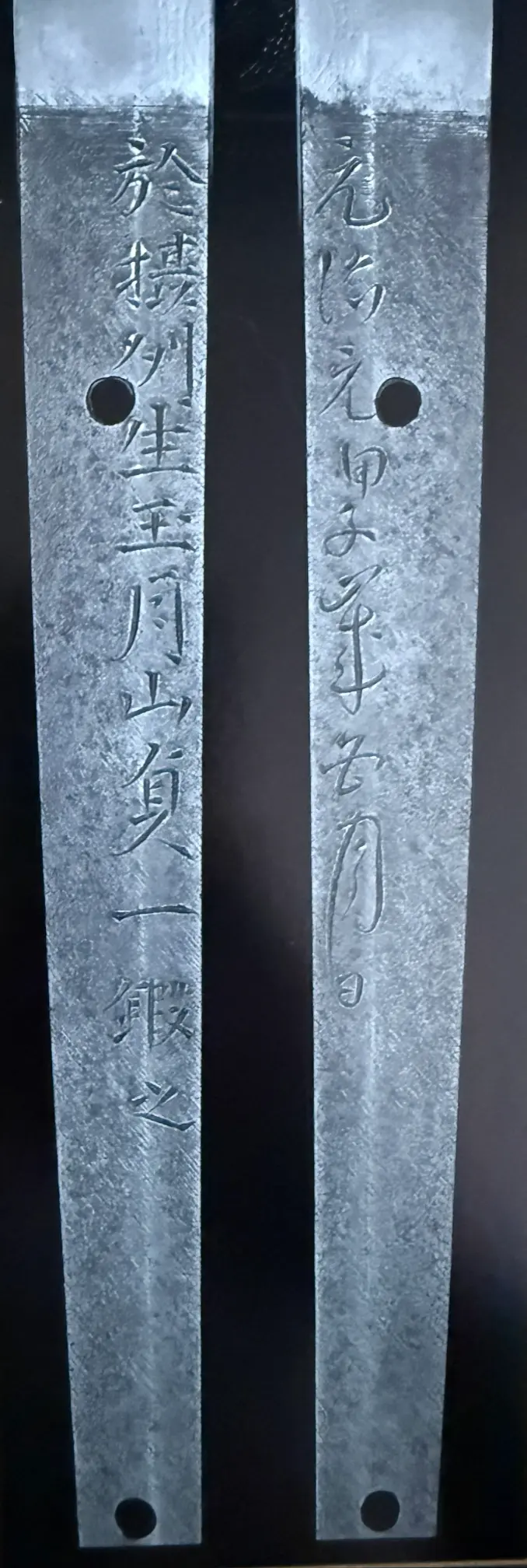 Close-up of Japanese Masterpice Gassan Sadakazu NBTHK Tokubetsu Hozon katana tangs with clear inscription