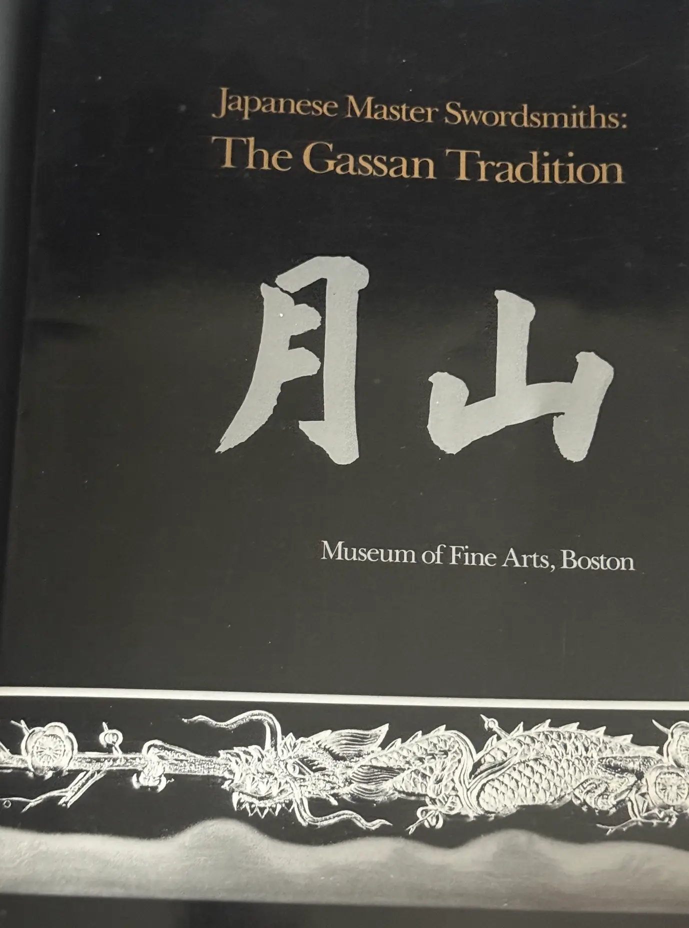 Close-up image of "The Gassan Tradition" book cover, documenting the Gassan Sadakazu Japanese masterpiece katana
