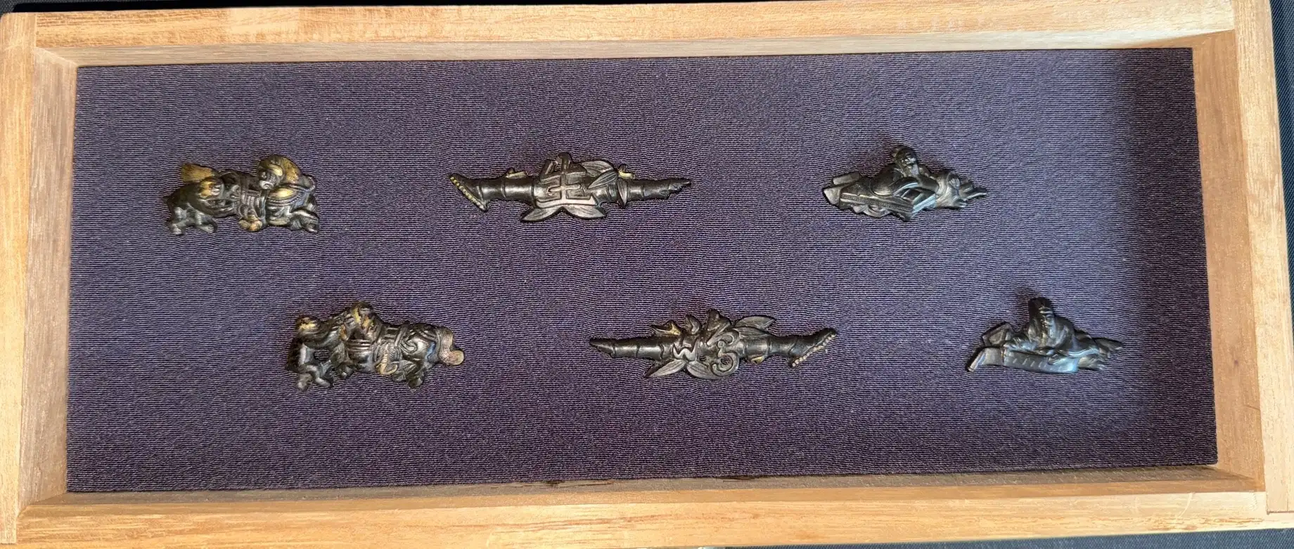 Top-down view Edo period Menuki 9 pairs in a Kiri box, beautiful sword accessories displayed